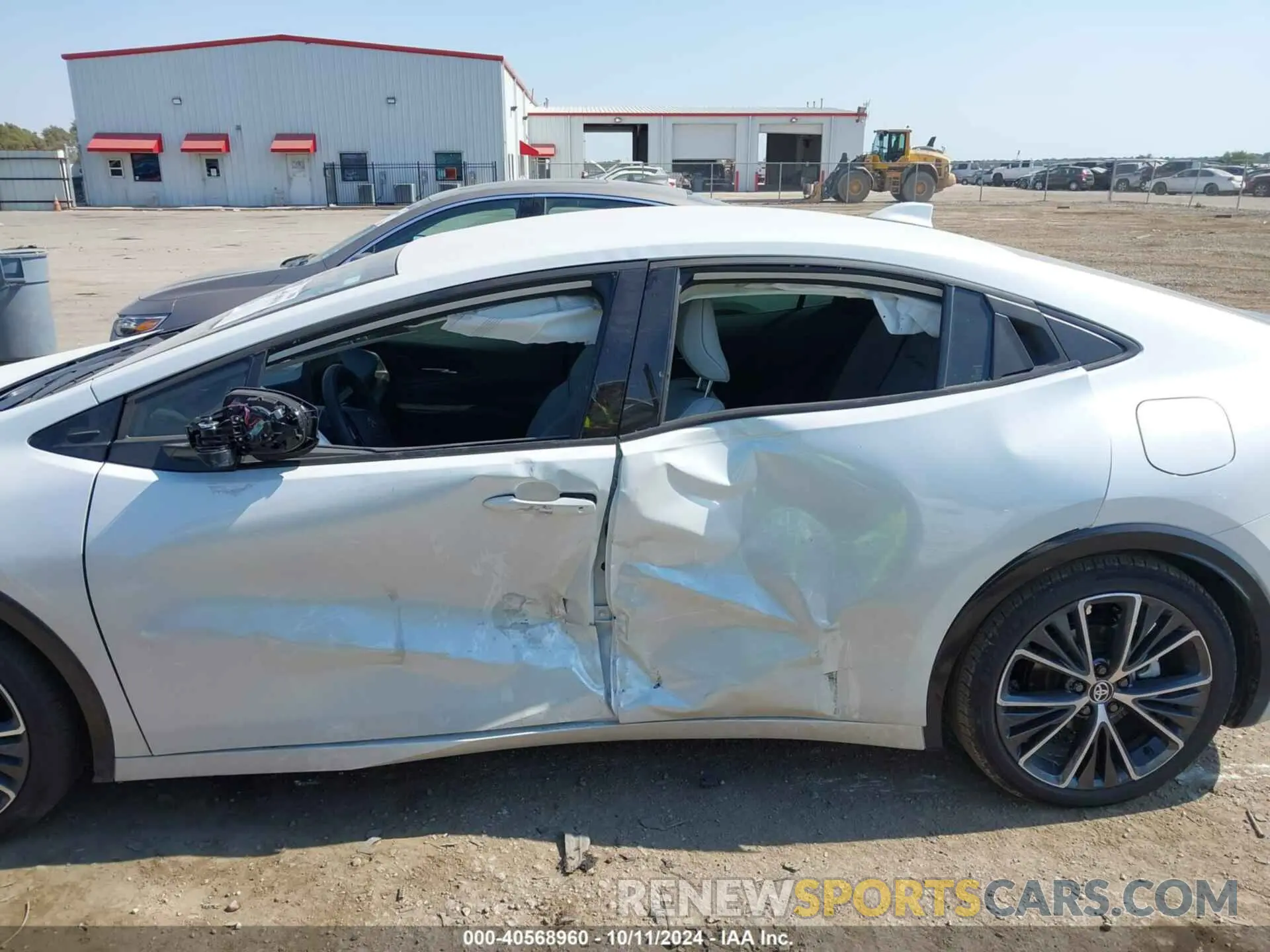 14 Photograph of a damaged car JTDACAAU6P3011869 TOYOTA PRIUS 2023