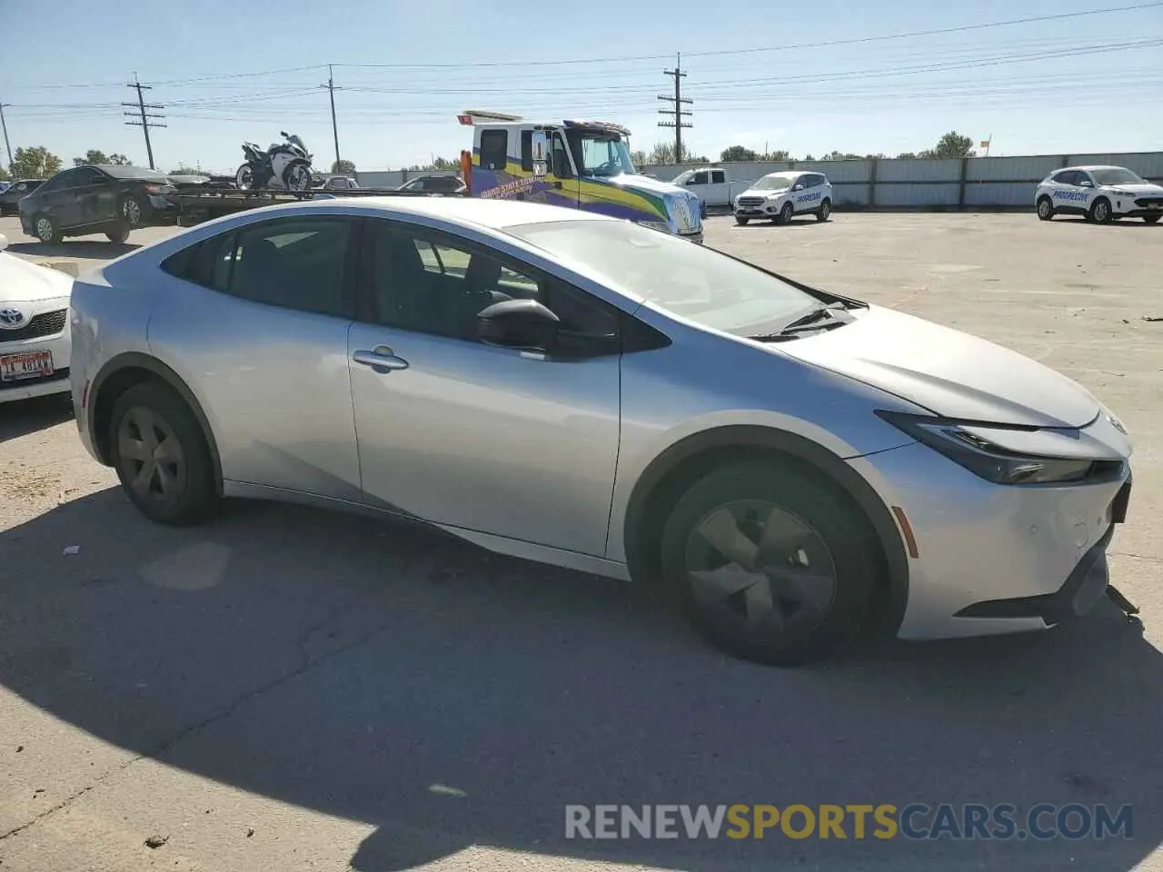 4 Photograph of a damaged car JTDACAAU8P3004633 TOYOTA PRIUS 2023