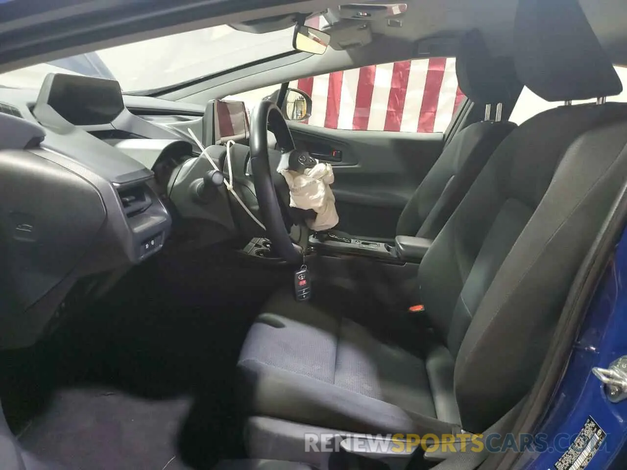 7 Photograph of a damaged car JTDACAAUXP3010661 TOYOTA PRIUS 2023