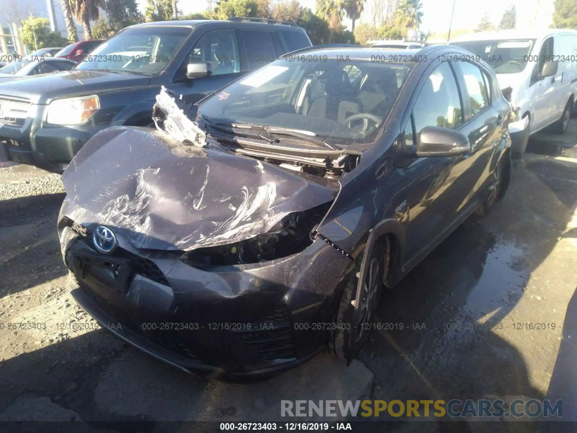 2 Photograph of a damaged car JTDKDTB33K1624488 TOYOTA PRIUS C 2019