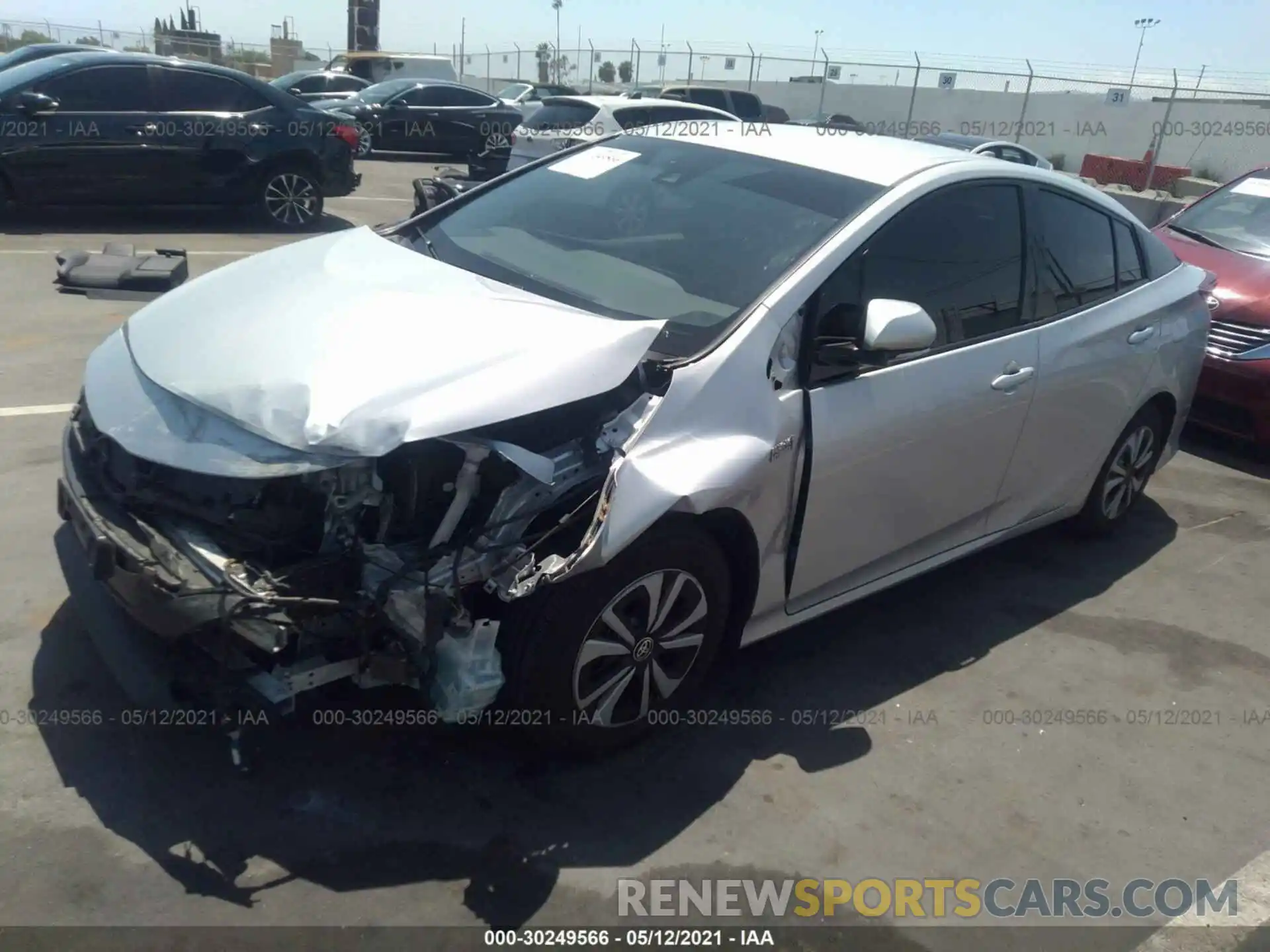 2 Photograph of a damaged car JTDKARFP0K3106934 TOYOTA PRIUS PRIME 2019