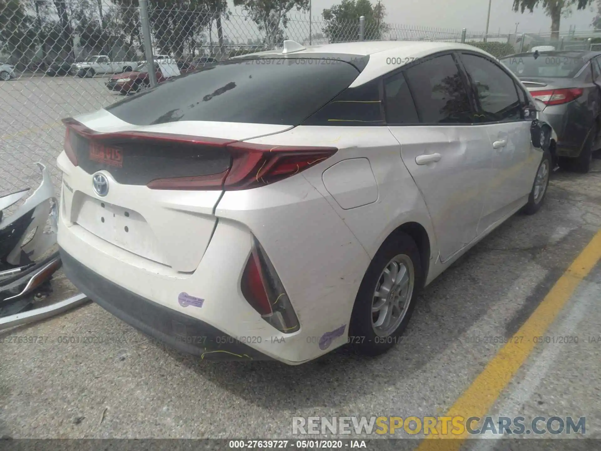 4 Photograph of a damaged car JTDKARFP0K3115357 TOYOTA PRIUS PRIME 2019