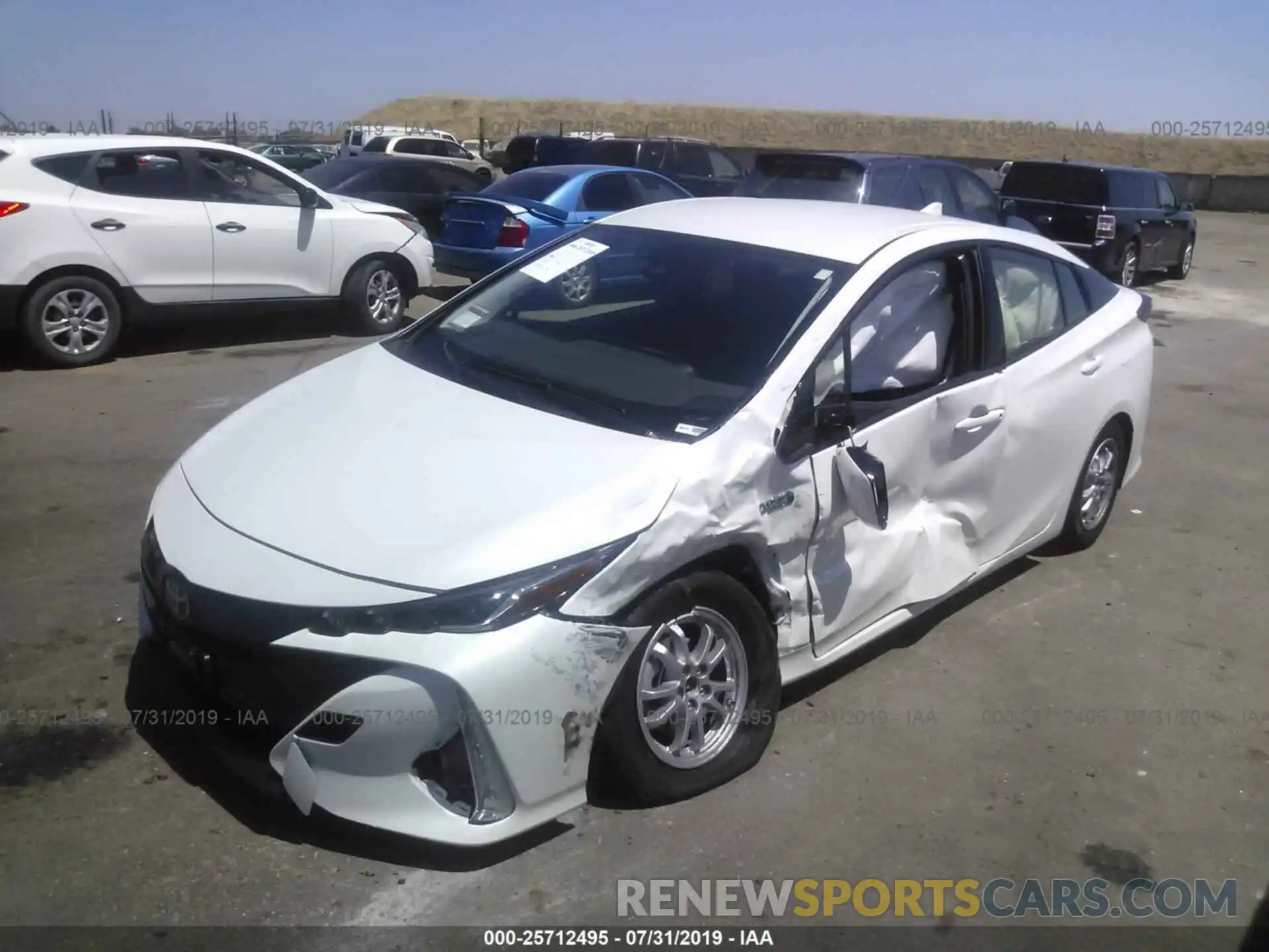 2 Photograph of a damaged car JTDKARFP0K3118632 TOYOTA PRIUS PRIME 2019