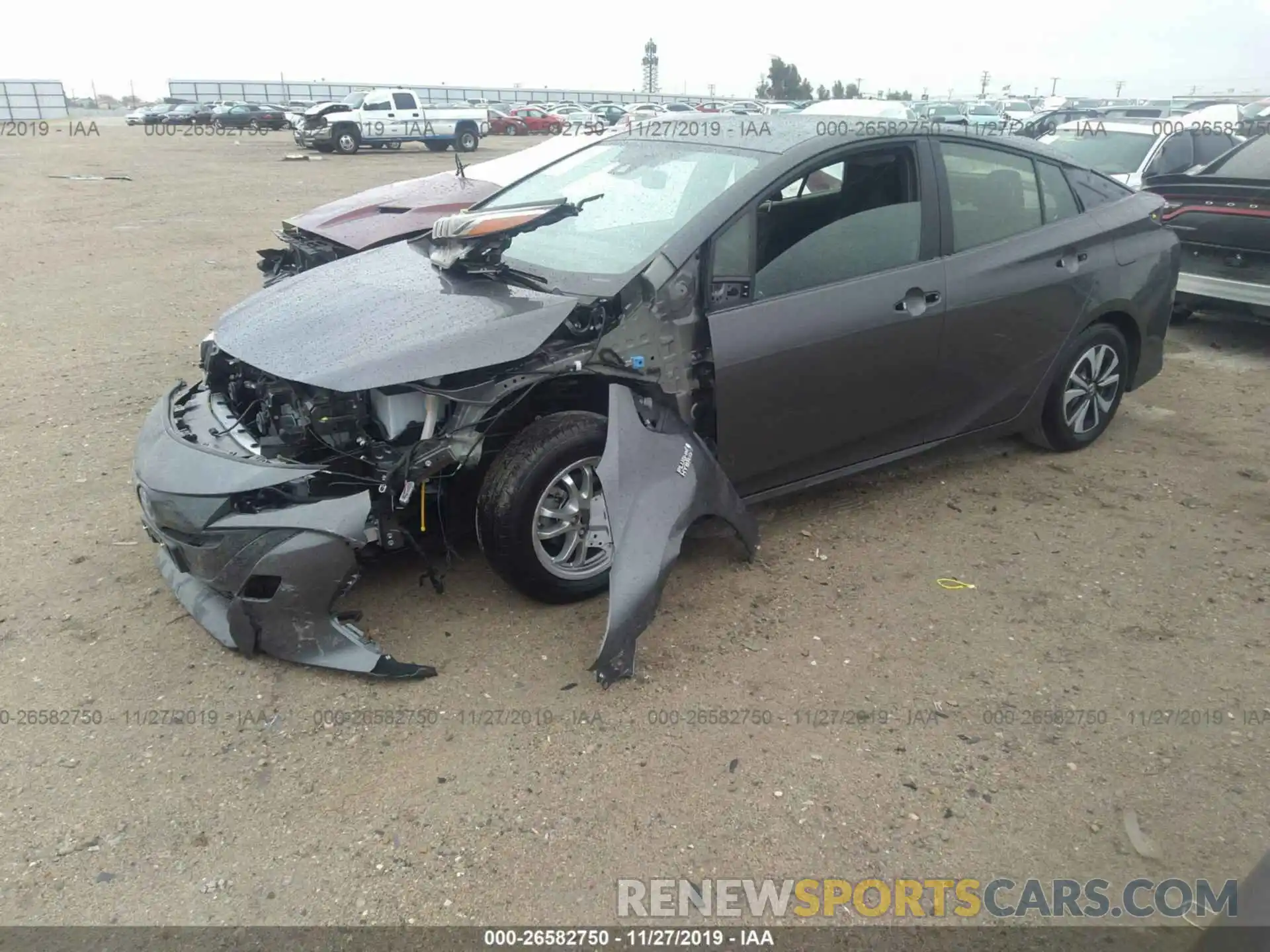 2 Photograph of a damaged car JTDKARFP2K3105946 TOYOTA PRIUS PRIME 2019