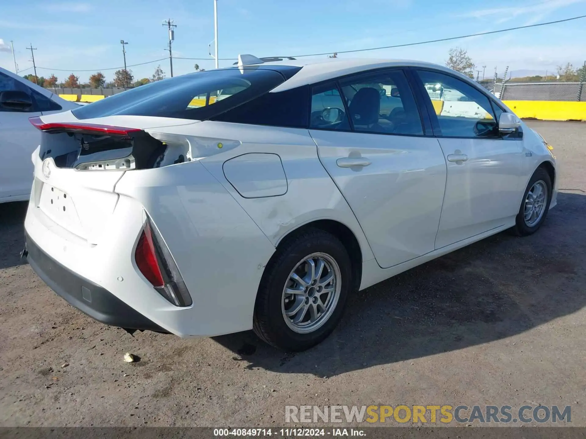 4 Photograph of a damaged car JTDKARFP3K3116714 TOYOTA PRIUS PRIME 2019