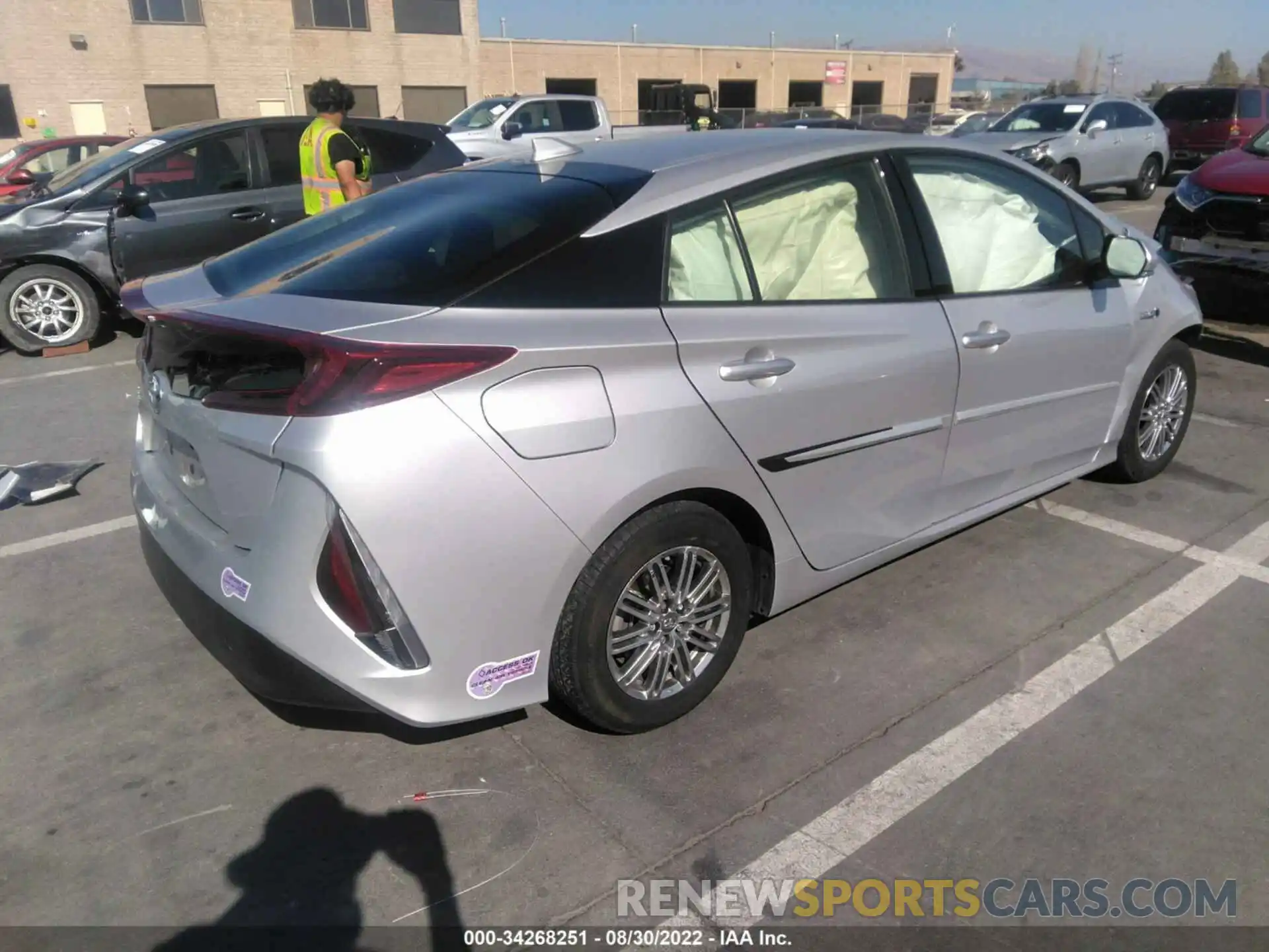 4 Photograph of a damaged car JTDKARFP4K3106614 TOYOTA PRIUS PRIME 2019