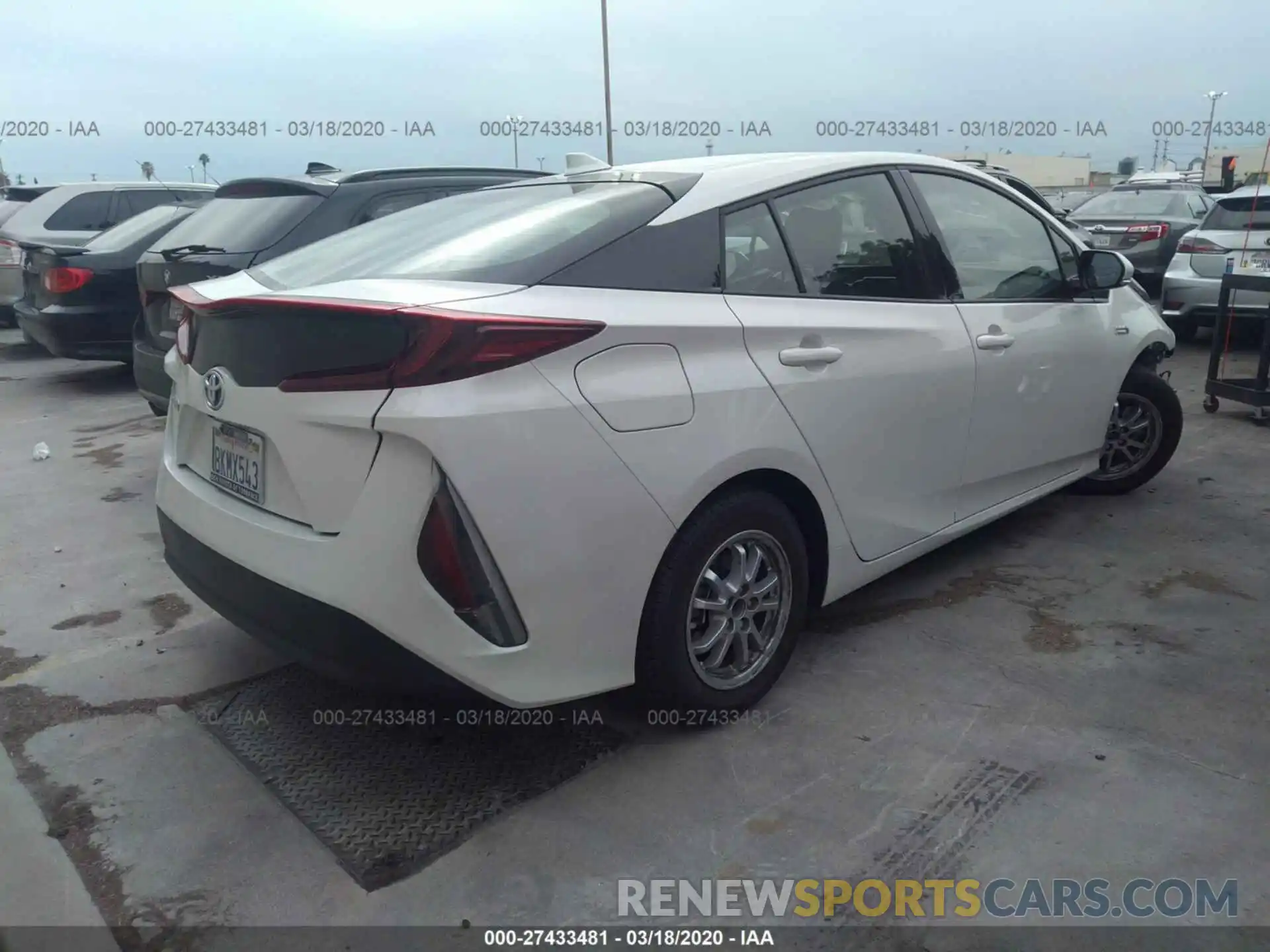 4 Photograph of a damaged car JTDKARFP6K3118246 TOYOTA PRIUS PRIME 2019