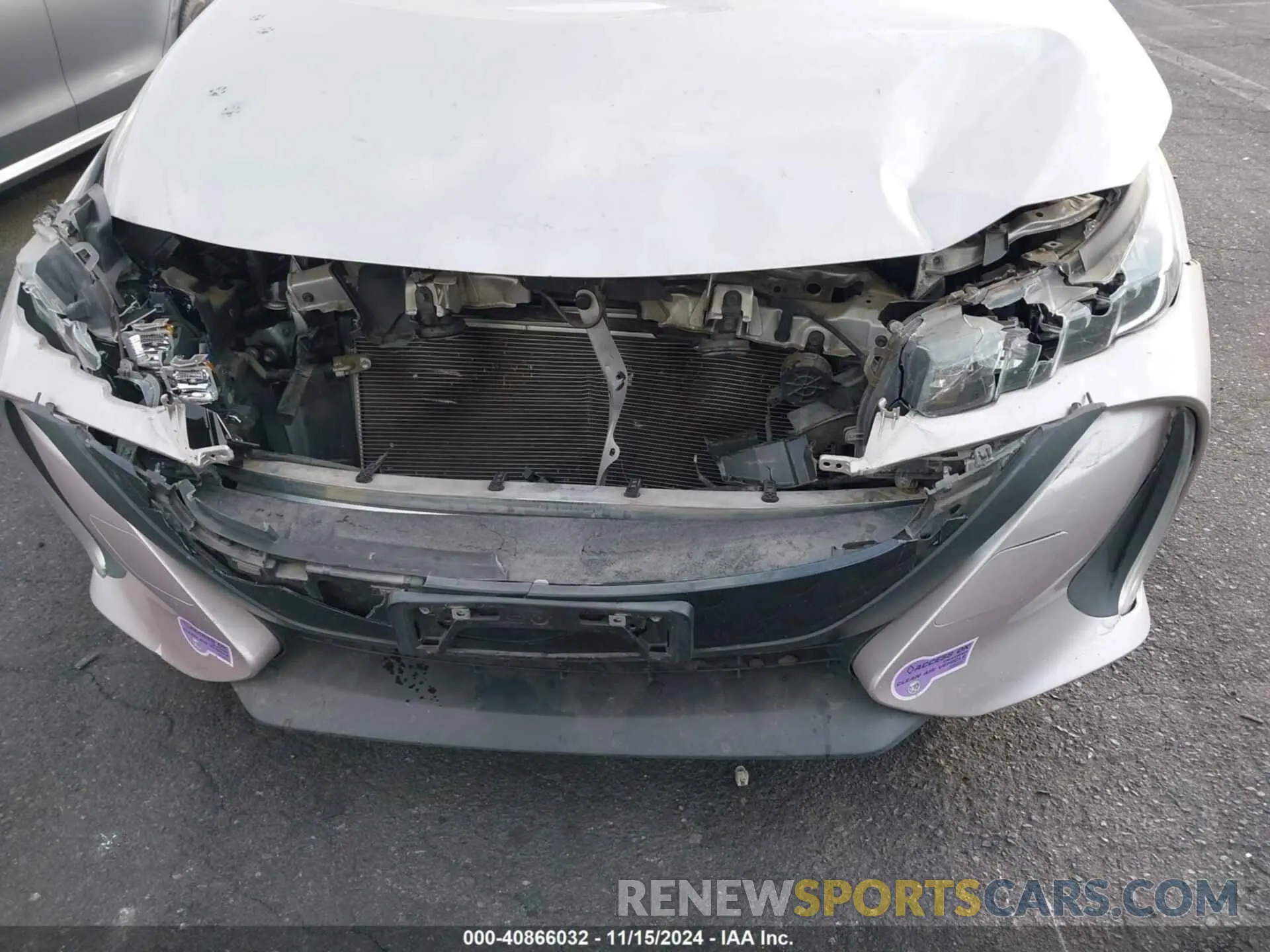 12 Photograph of a damaged car JTDKARFP7K3116232 TOYOTA PRIUS PRIME 2019