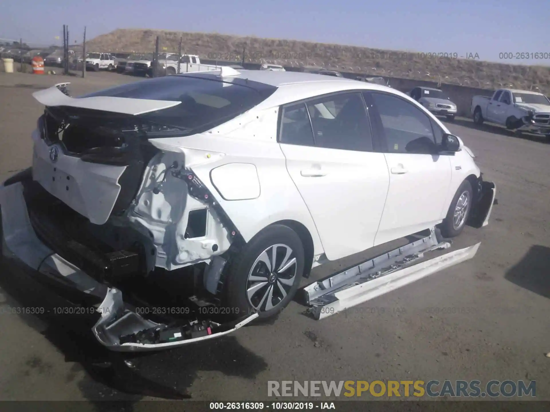 4 Photograph of a damaged car JTDKARFP8K3105806 TOYOTA PRIUS PRIME 2019