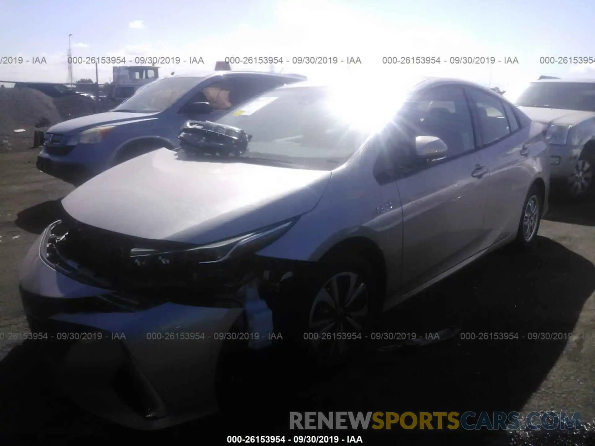 2 Photograph of a damaged car JTDKARFP8K3116725 TOYOTA PRIUS PRIME 2019