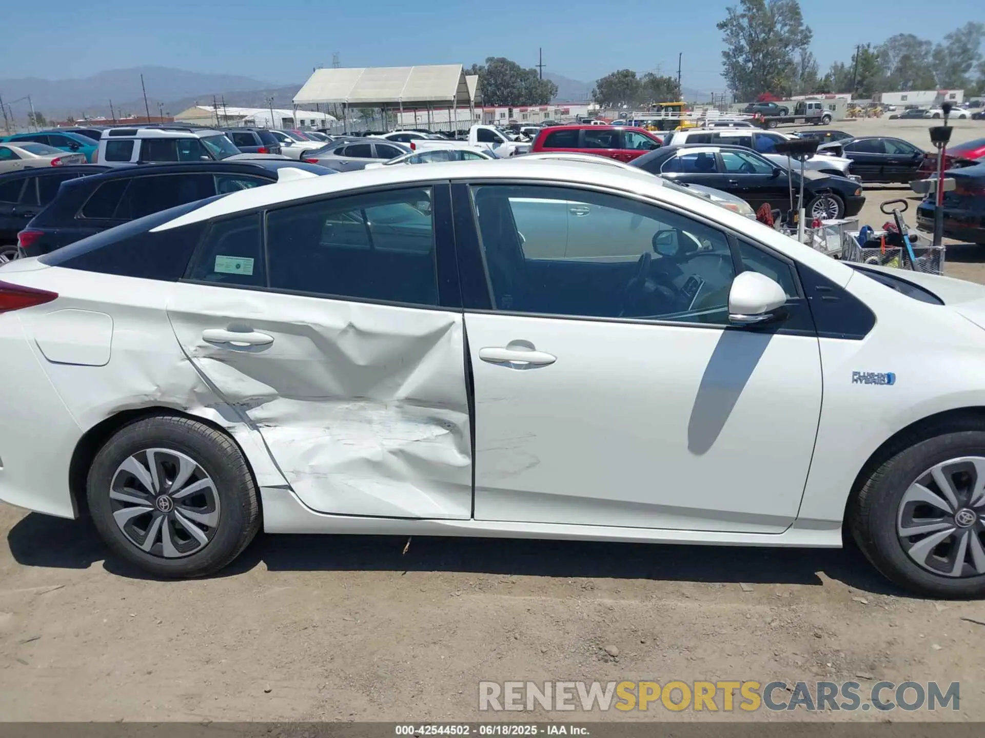 13 Photograph of a damaged car JTDKARFP9K3109945 TOYOTA PRIUS PRIME 2019