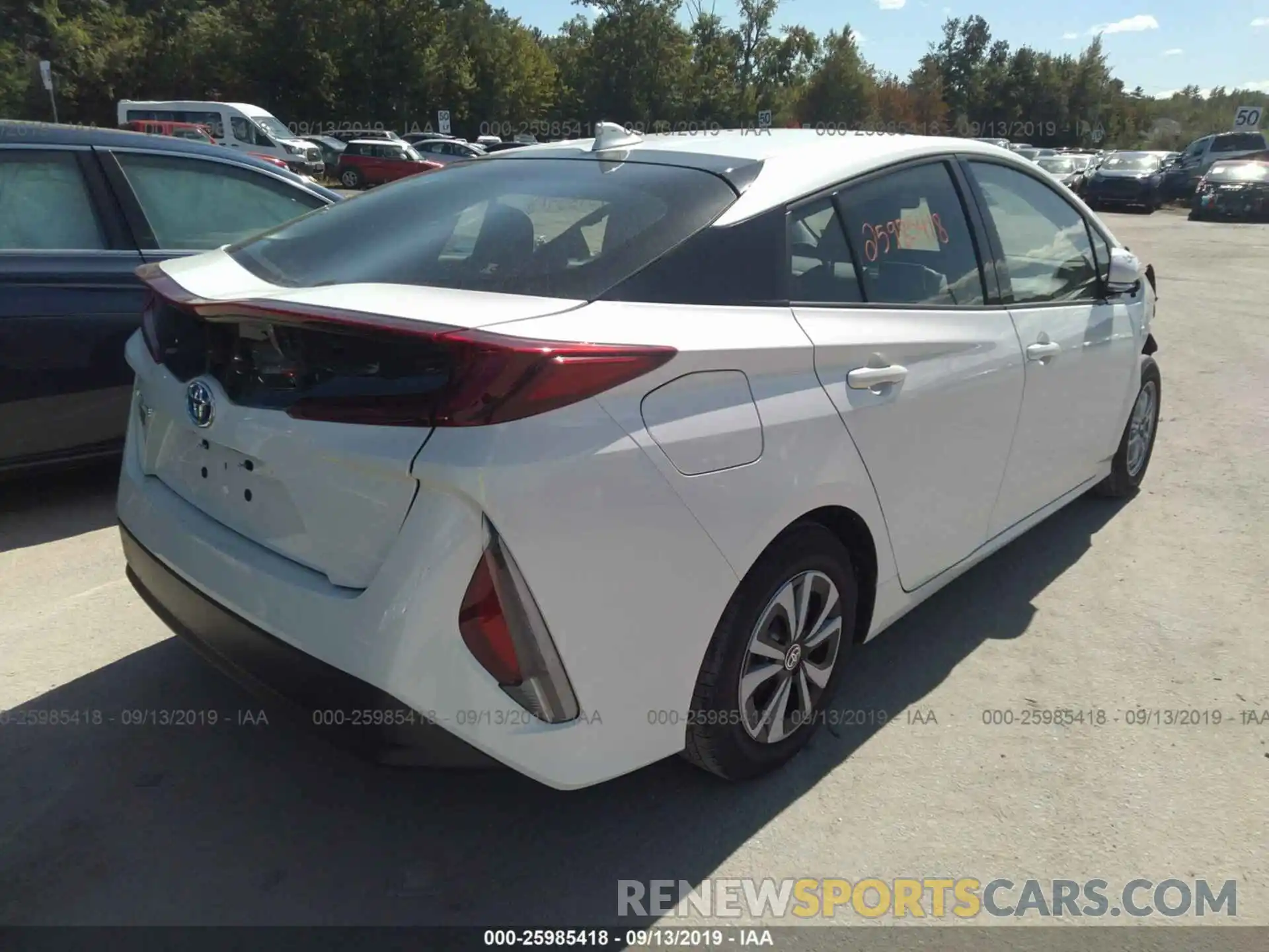 4 Photograph of a damaged car JTDKARFPXK3116788 TOYOTA PRIUS PRIME 2019