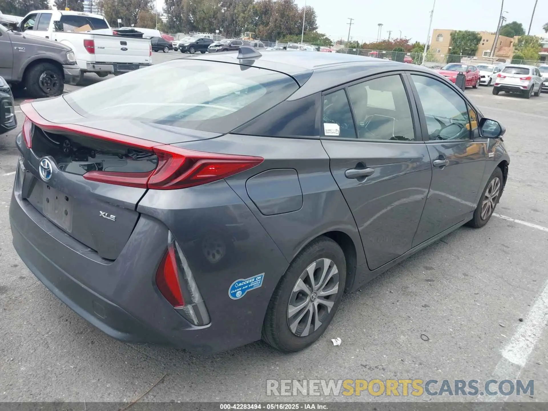 4 Photograph of a damaged car JTDKAMFP0M3193305 TOYOTA PRIUS PRIME 2021