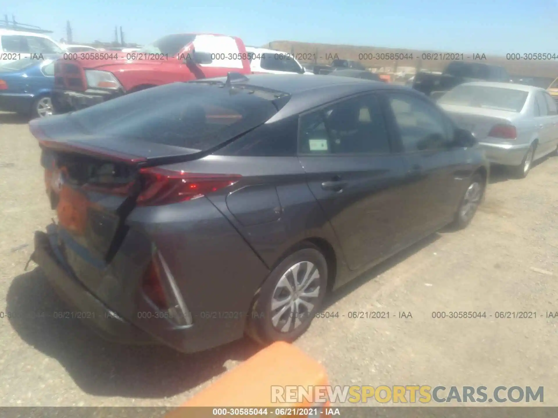 4 Photograph of a damaged car JTDKAMFP1M3175752 TOYOTA PRIUS PRIME 2021