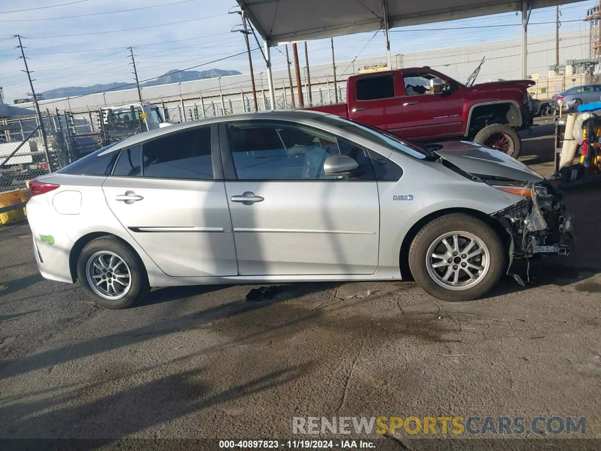 14 Photograph of a damaged car JTDKAMFP2M3194066 TOYOTA PRIUS PRIME 2021