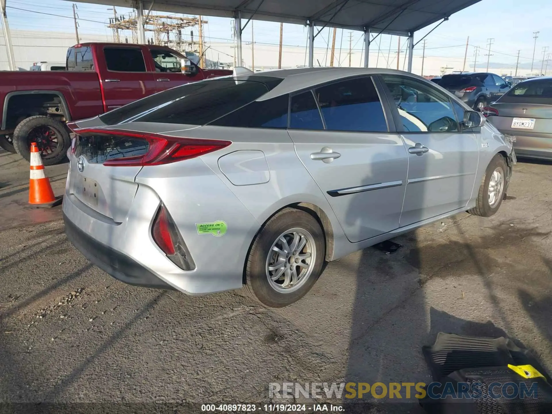 4 Photograph of a damaged car JTDKAMFP2M3194066 TOYOTA PRIUS PRIME 2021