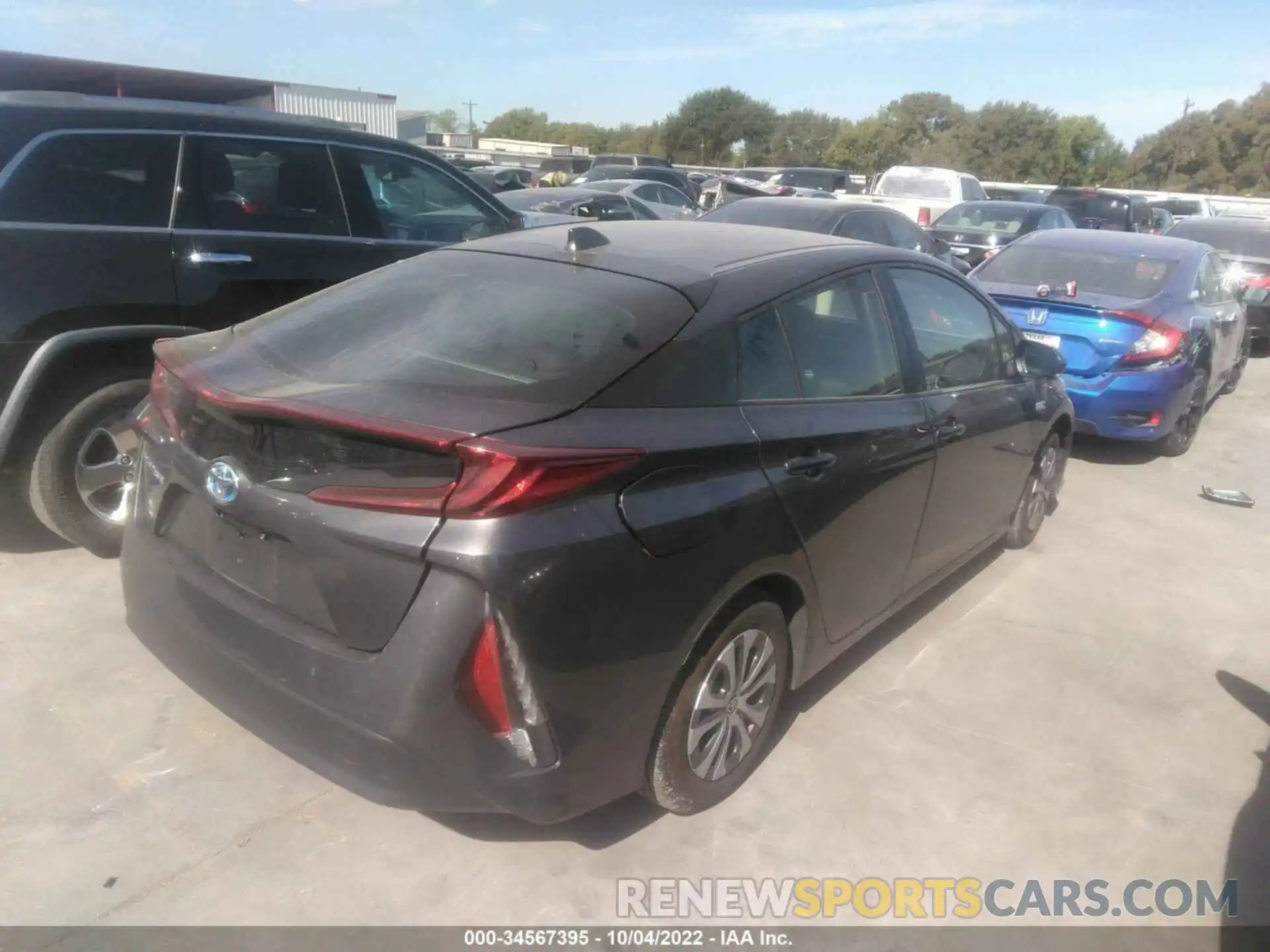 4 Photograph of a damaged car JTDKAMFP3M3186168 TOYOTA PRIUS PRIME 2021