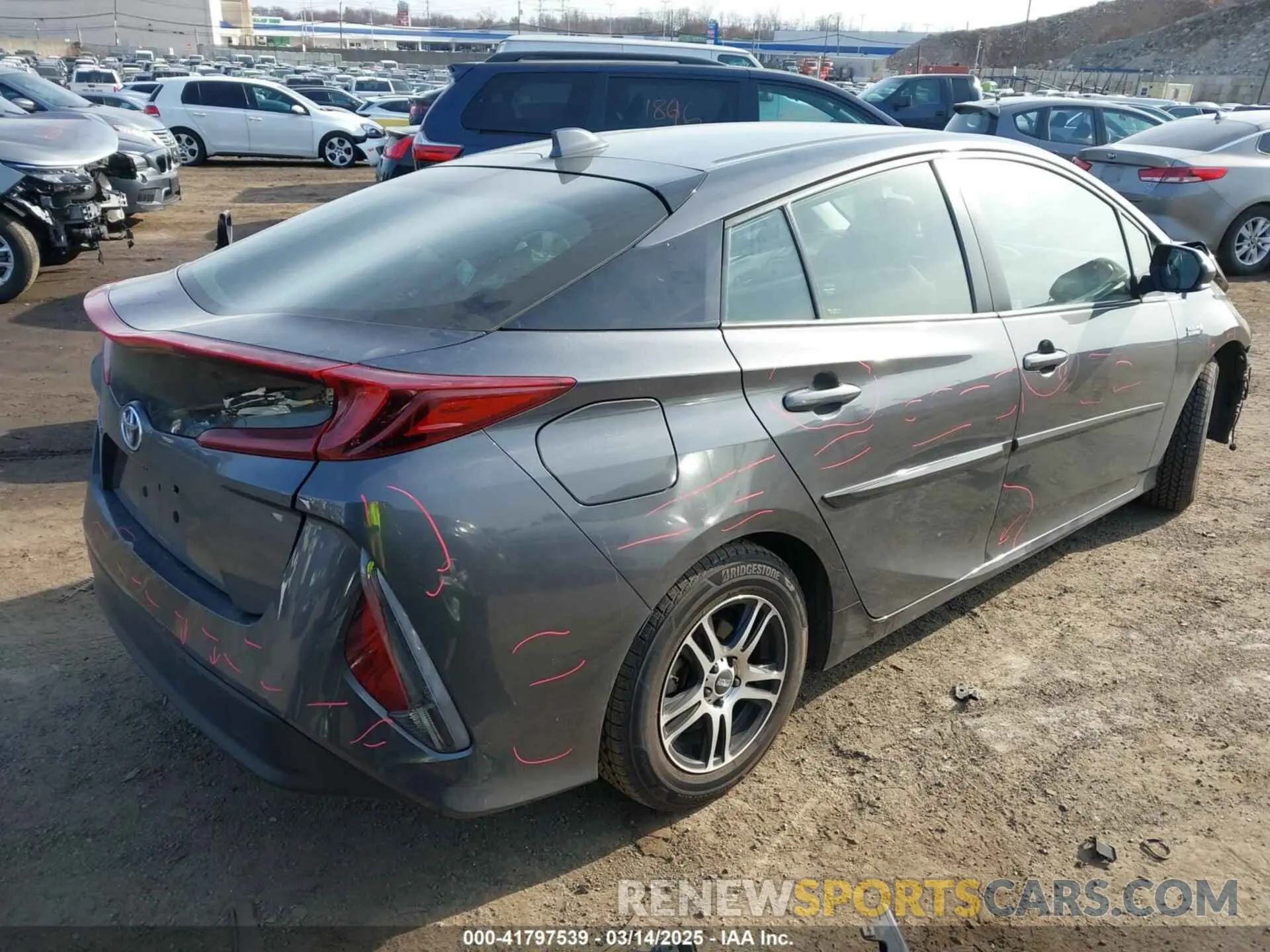 4 Photograph of a damaged car JTDKAMFP4M3165667 TOYOTA PRIUS PRIME 2021