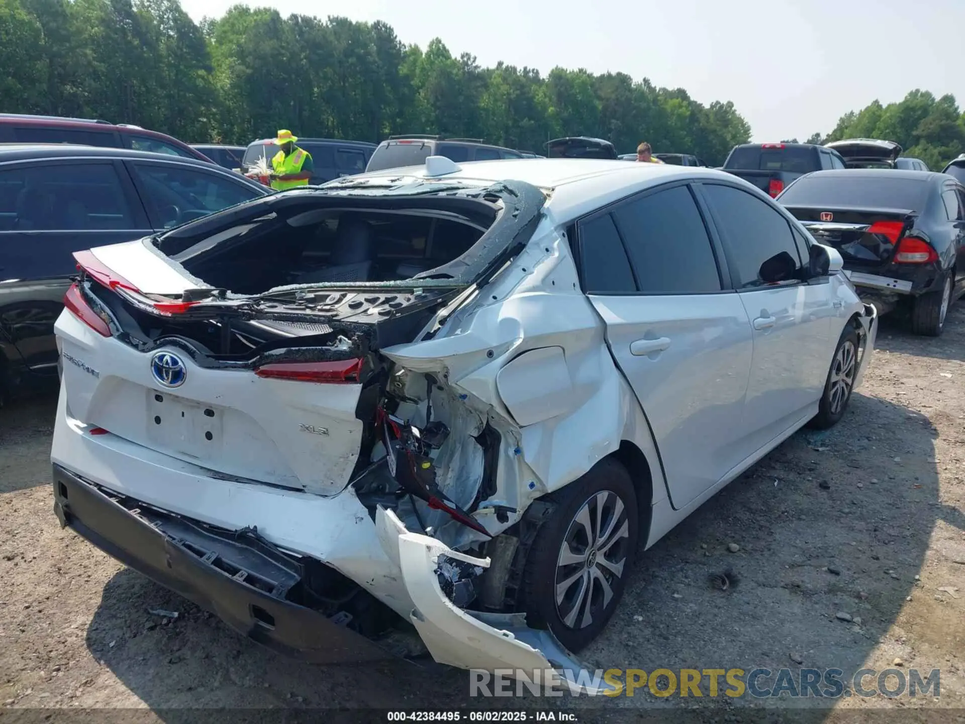 4 Photograph of a damaged car JTDKAMFP4M3169430 TOYOTA PRIUS PRIME 2021