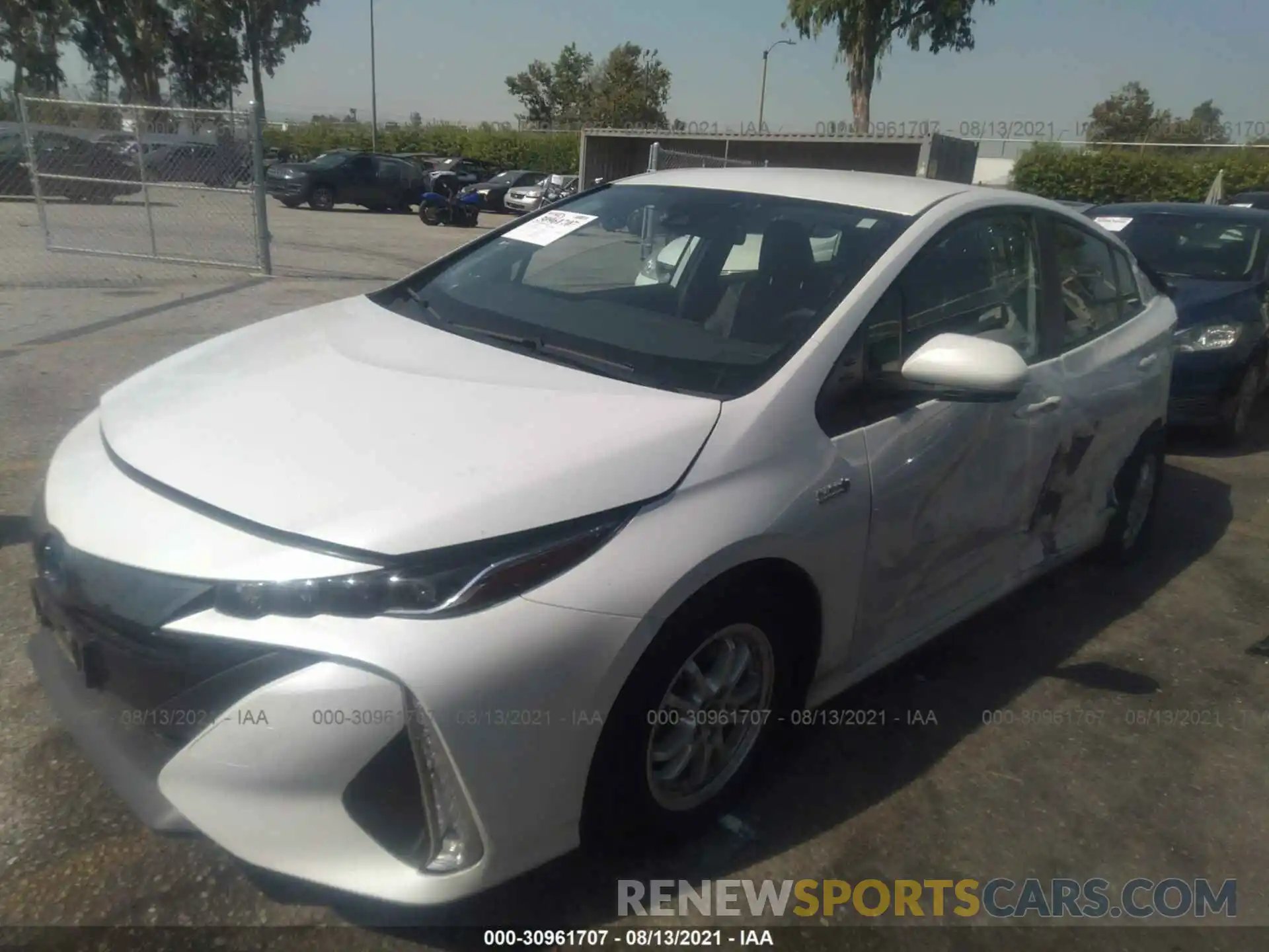 2 Photograph of a damaged car JTDKAMFP4M3190097 TOYOTA PRIUS PRIME 2021