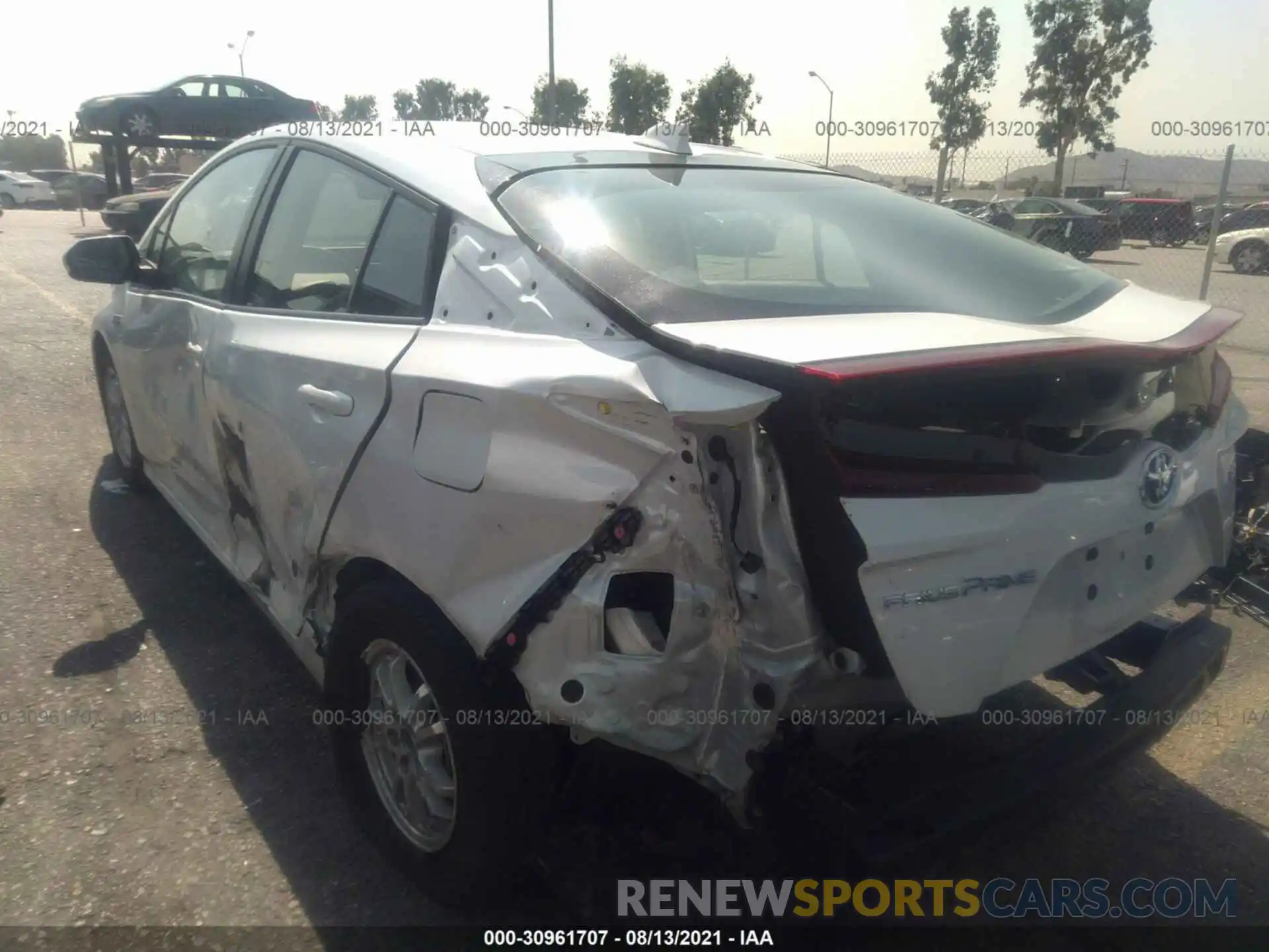 3 Photograph of a damaged car JTDKAMFP4M3190097 TOYOTA PRIUS PRIME 2021