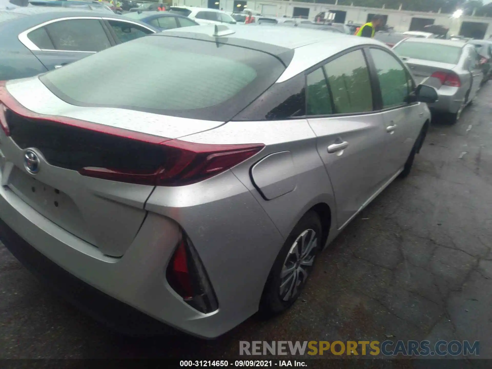 4 Photograph of a damaged car JTDKAMFP5M3176502 TOYOTA PRIUS PRIME 2021