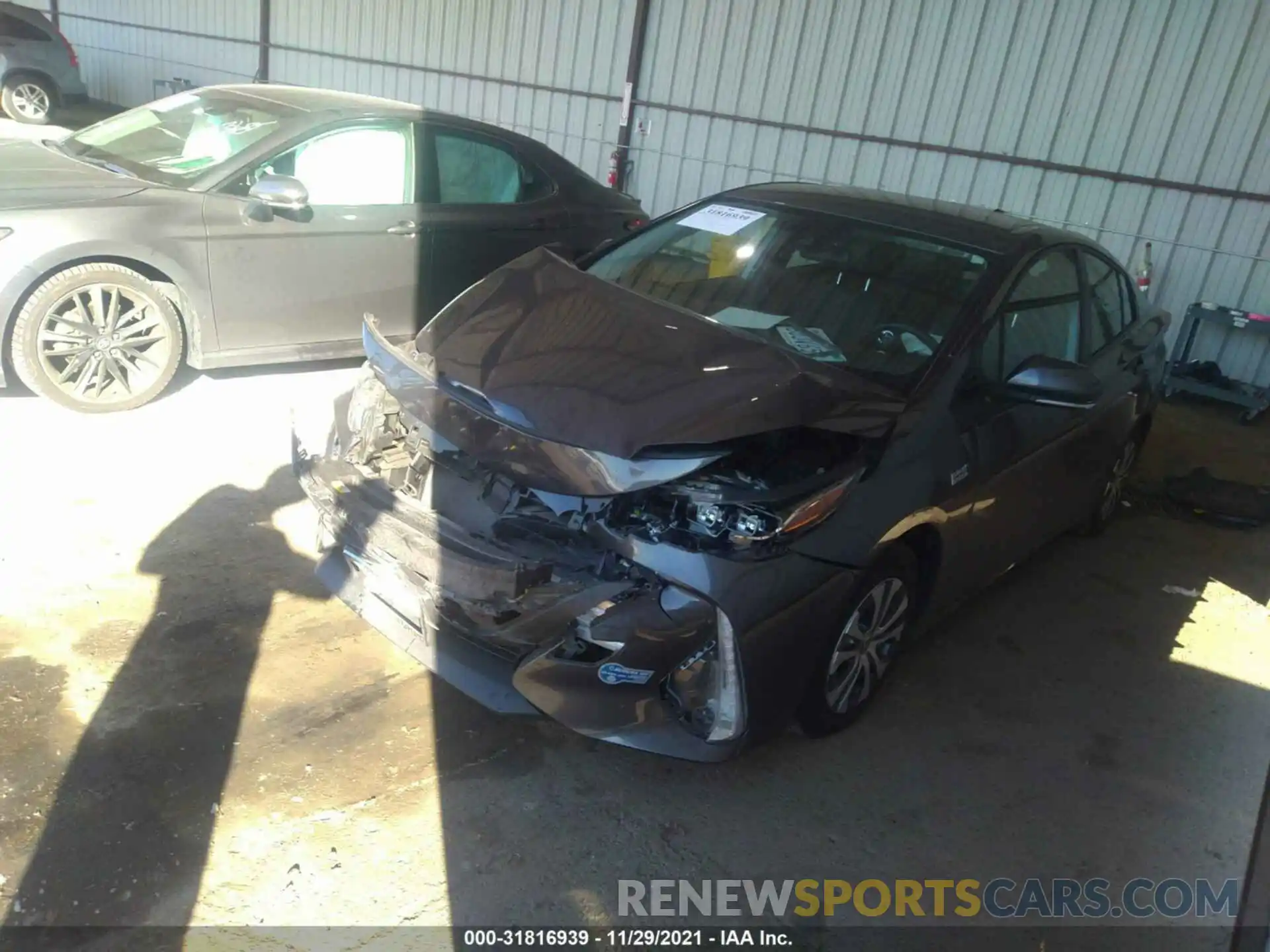 2 Photograph of a damaged car JTDKAMFP6M3166657 TOYOTA PRIUS PRIME 2021