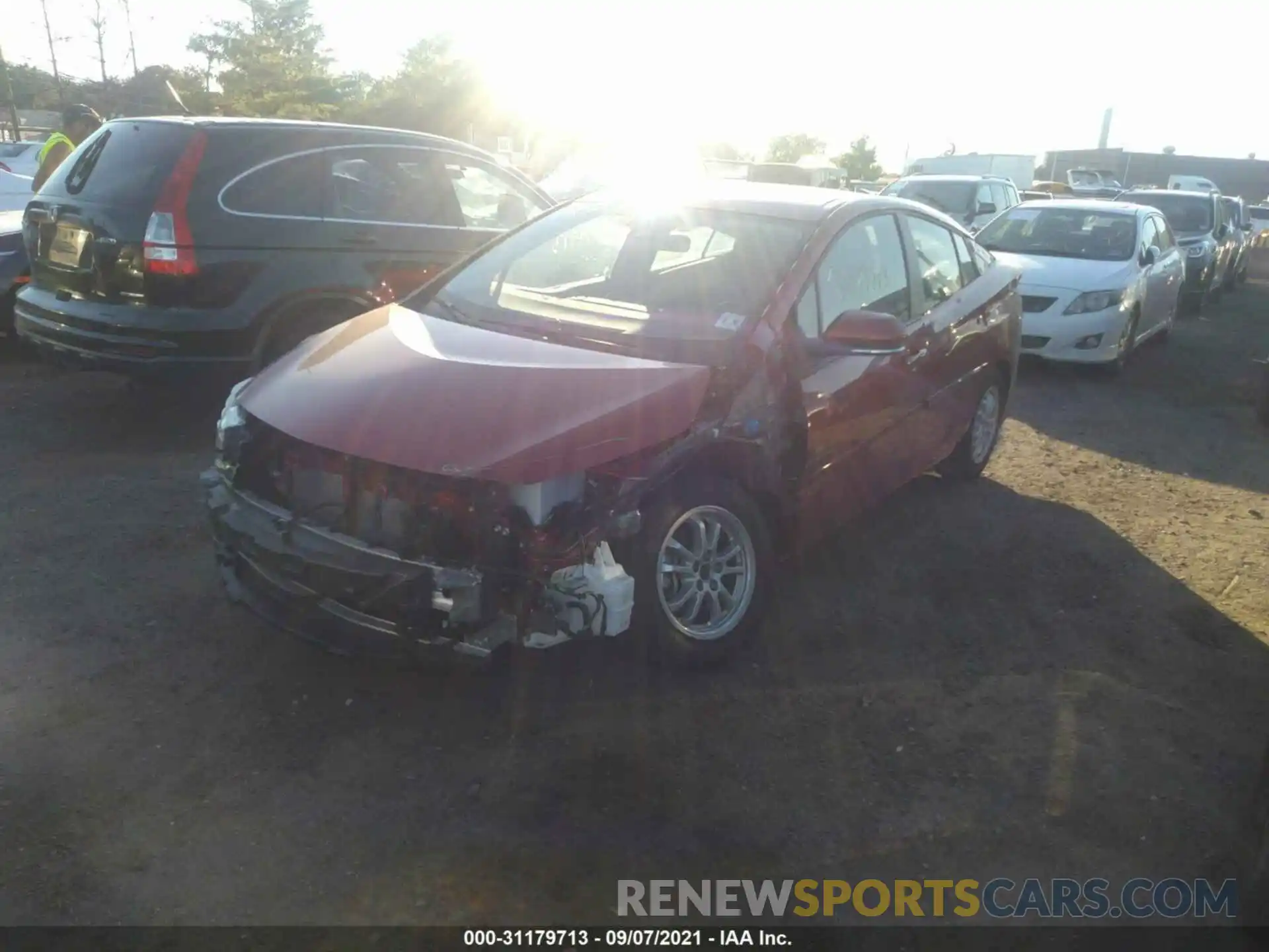 2 Photograph of a damaged car JTDKAMFP6M3180235 TOYOTA PRIUS PRIME 2021