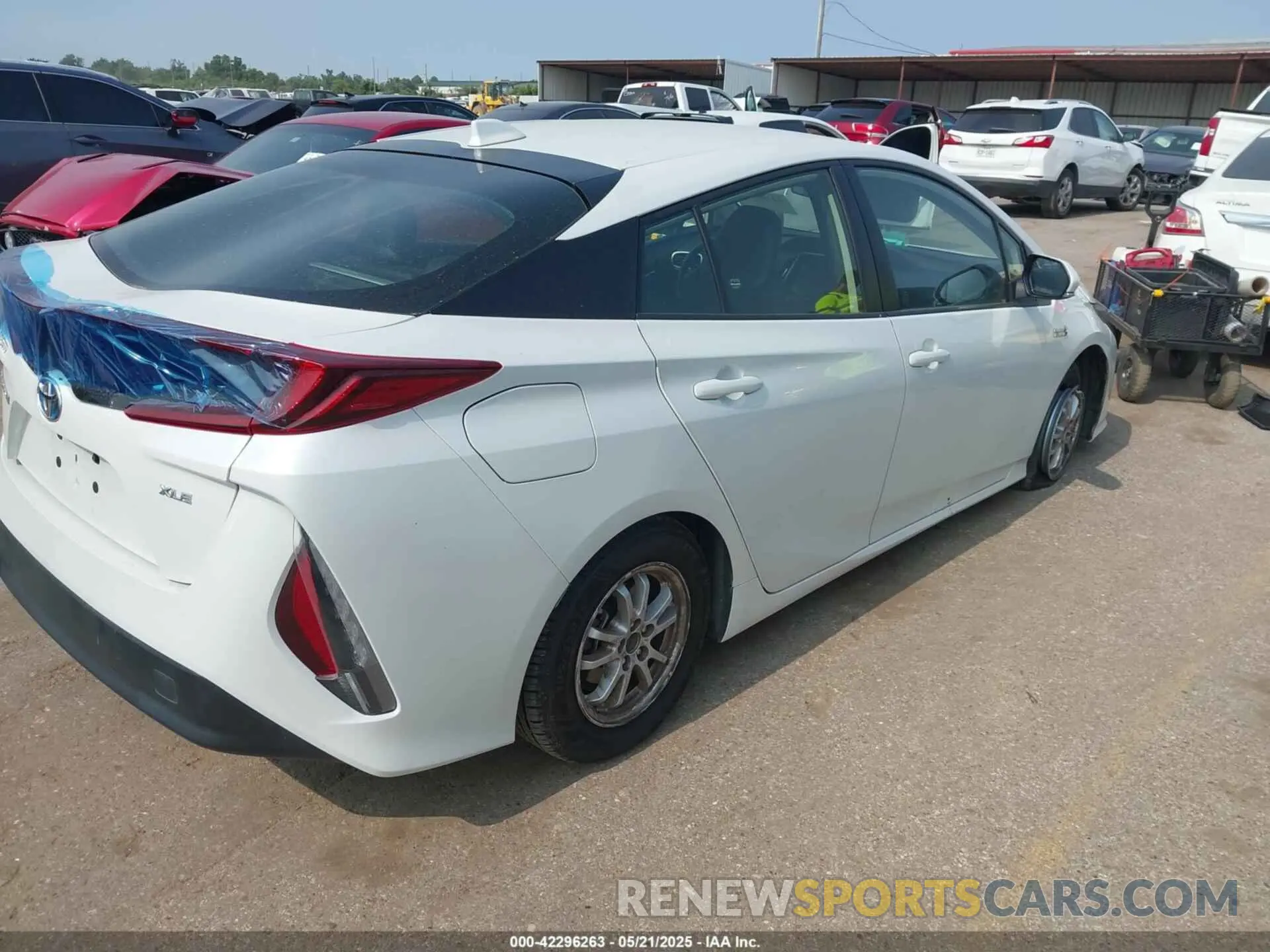 4 Photograph of a damaged car JTDKAMFP7M3194774 TOYOTA PRIUS PRIME 2021