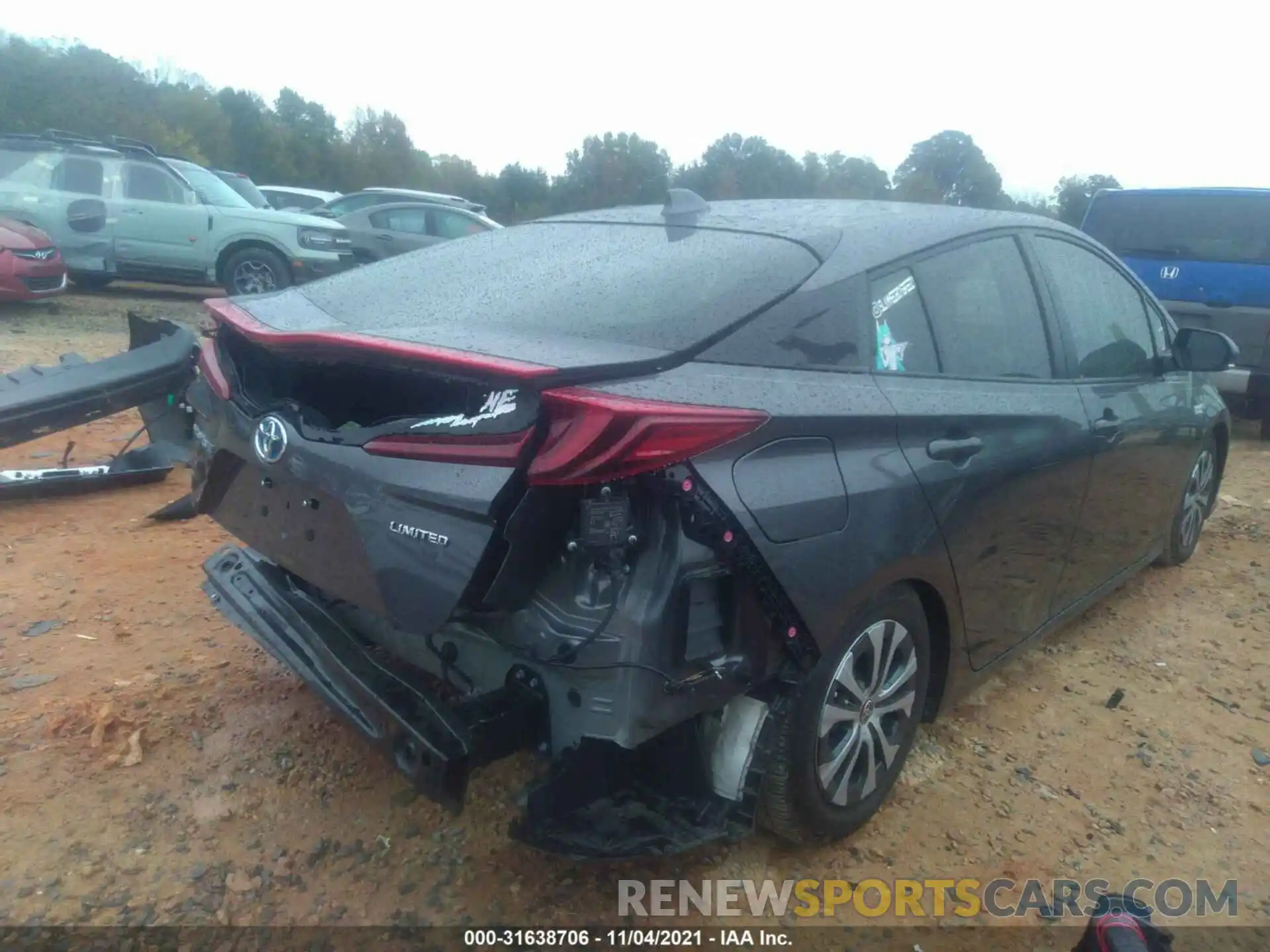 4 Photograph of a damaged car JTDKAMFP8M3195304 TOYOTA PRIUS PRIME 2021