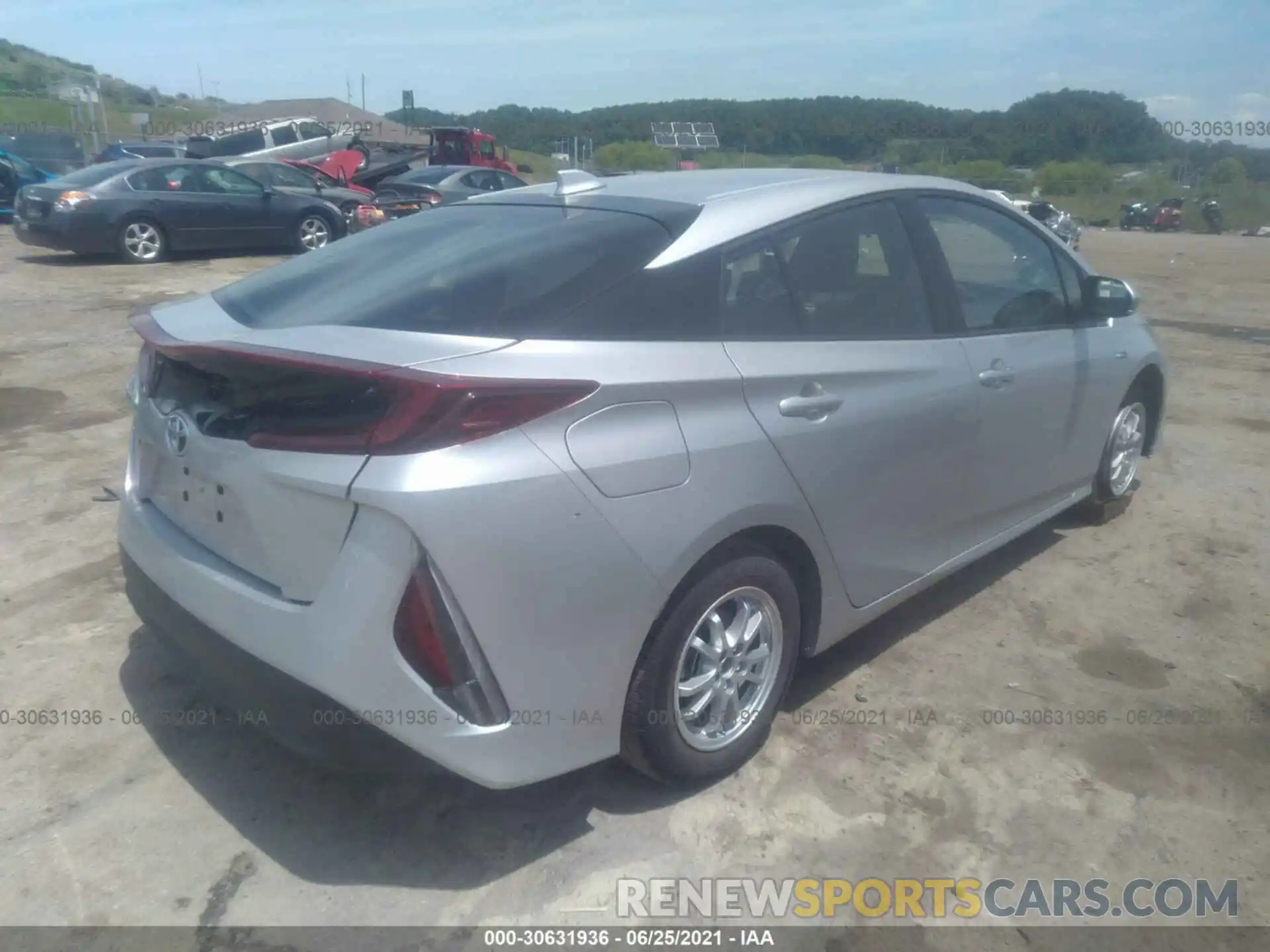 4 Photograph of a damaged car JTDKAMFP9M3181055 TOYOTA PRIUS PRIME 2021