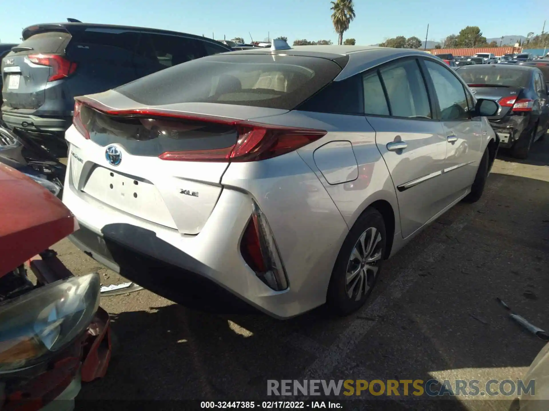 4 Photograph of a damaged car JTDKAMFP9M3190676 TOYOTA PRIUS PRIME 2021