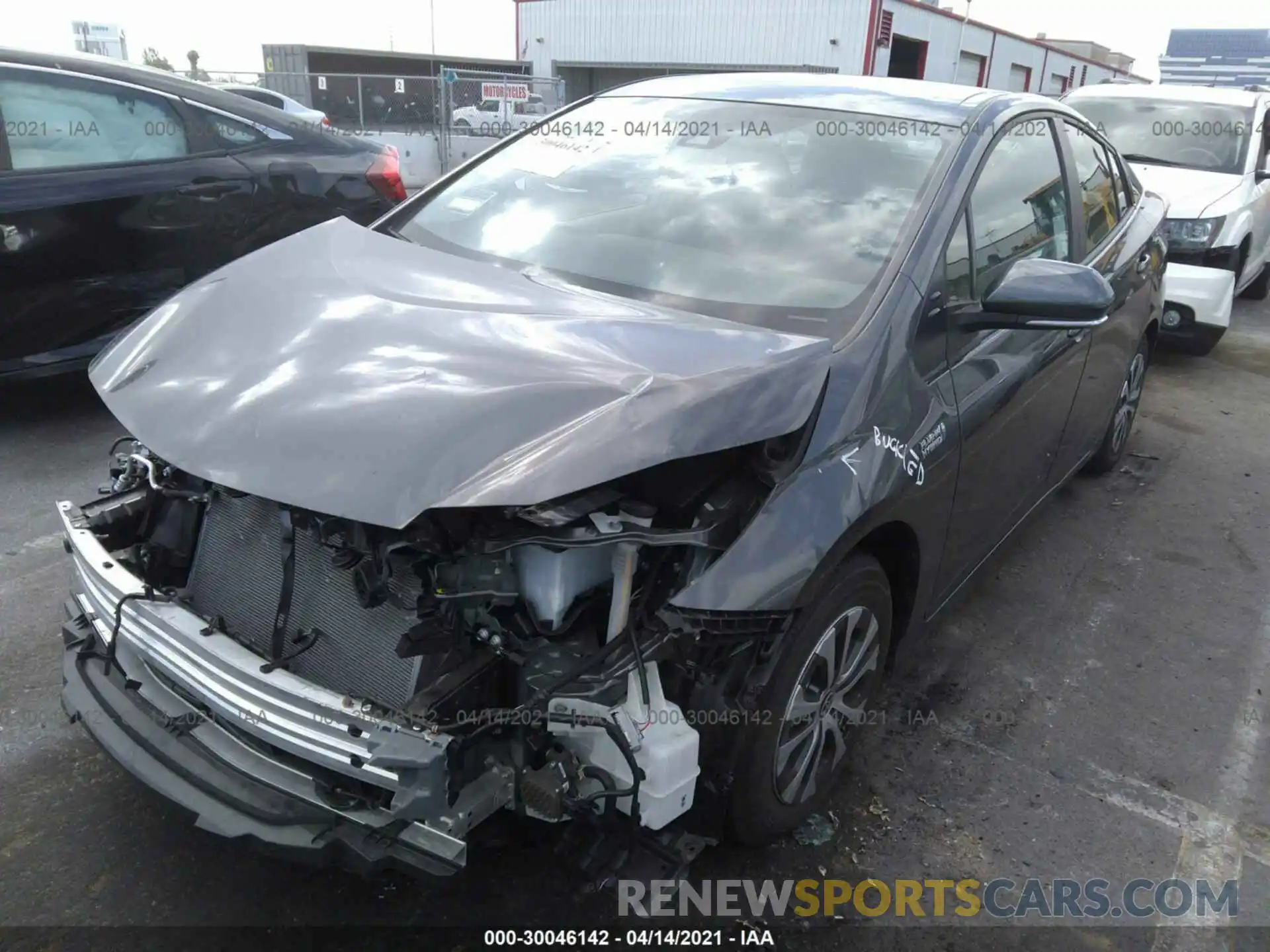 2 Photograph of a damaged car JTDKAMFPXM3169674 TOYOTA PRIUS PRIME 2021