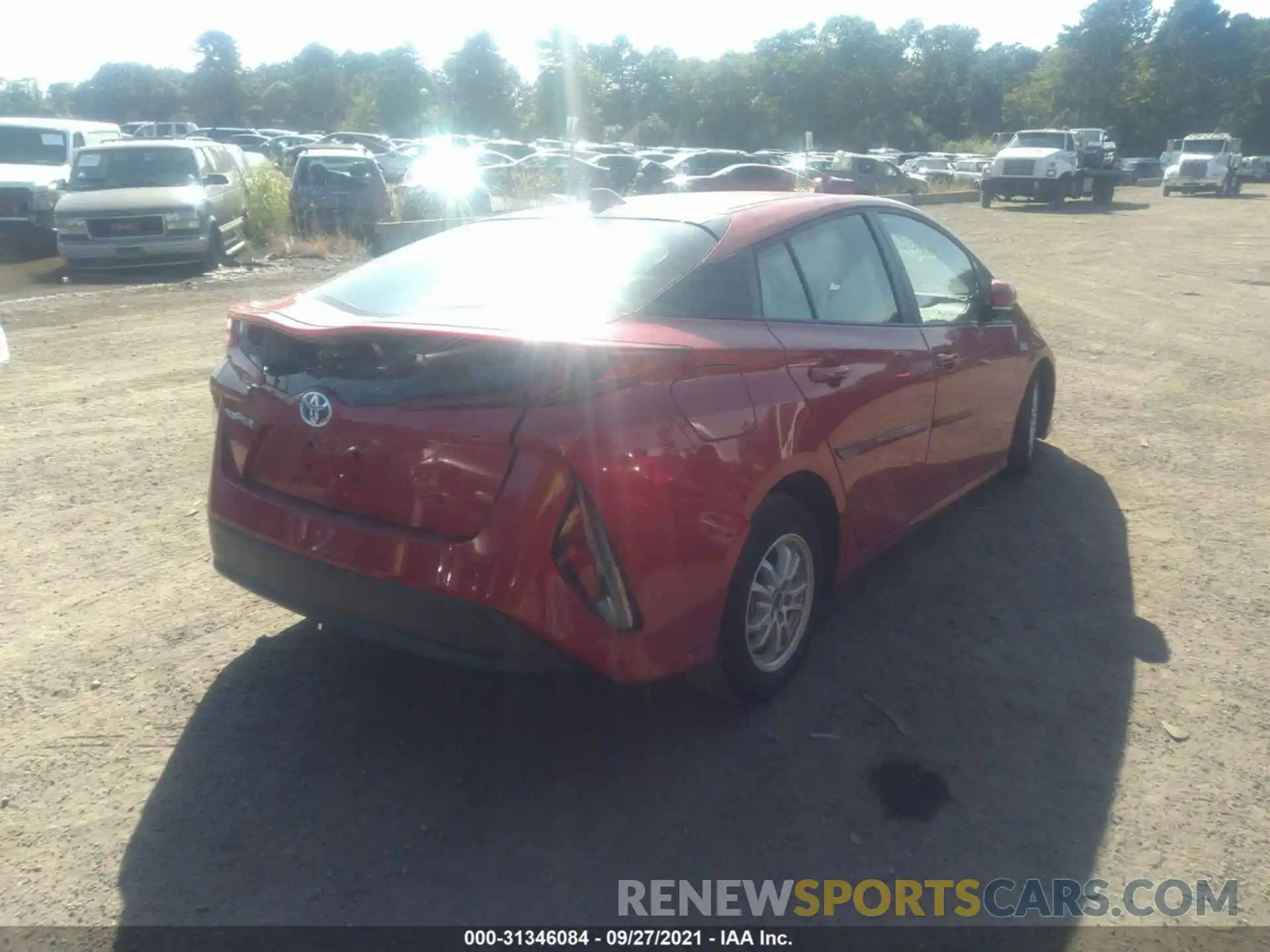 4 Photograph of a damaged car JTDKAMFPXM3170596 TOYOTA PRIUS PRIME 2021