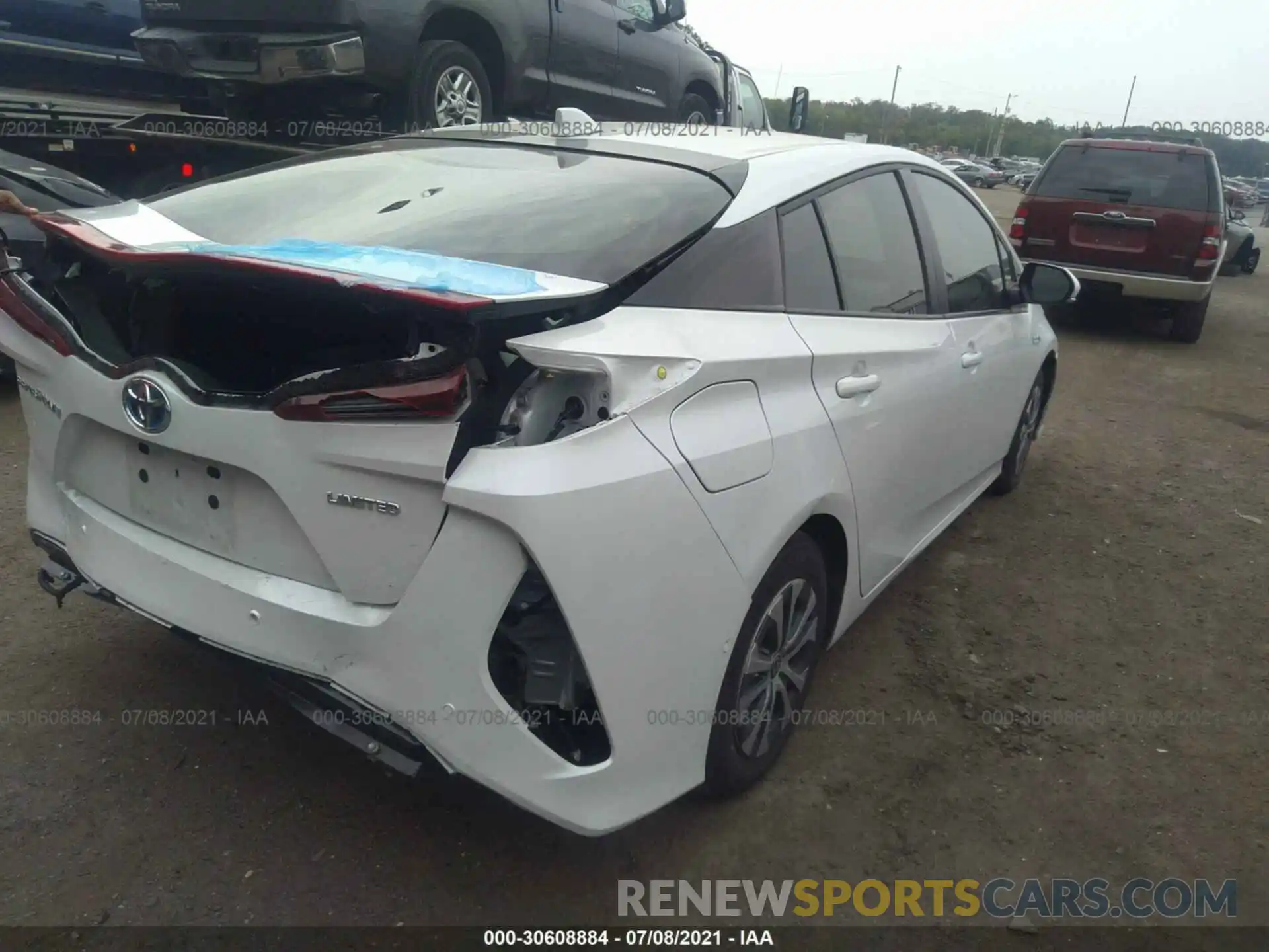 4 Photograph of a damaged car JTDKAMFPXM3178326 TOYOTA PRIUS PRIME 2021