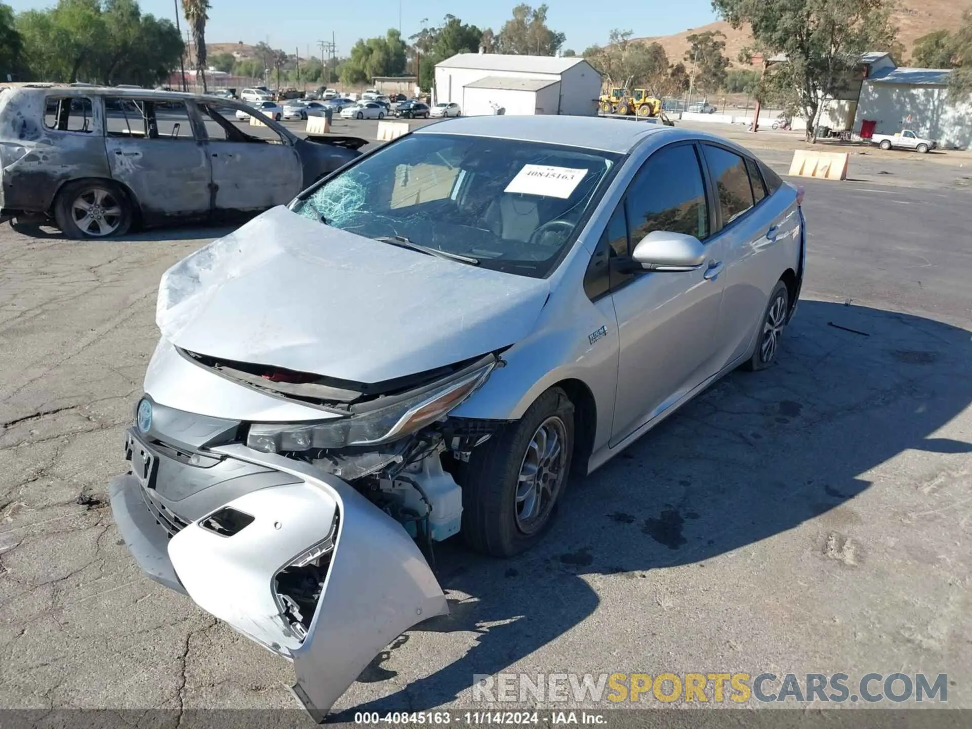 2 Photograph of a damaged car JTDKAMFPXM3180383 TOYOTA PRIUS PRIME 2021