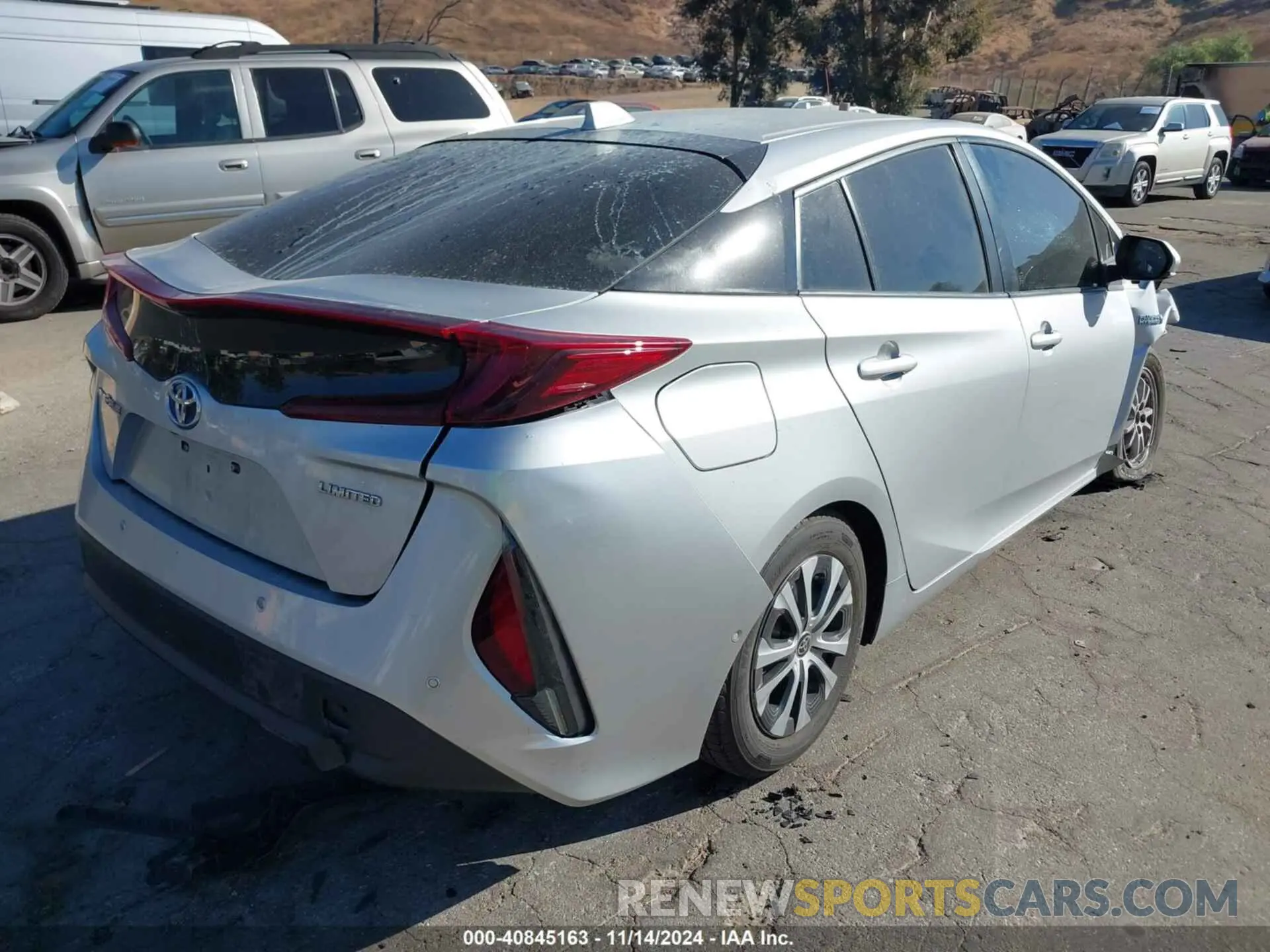 4 Photograph of a damaged car JTDKAMFPXM3180383 TOYOTA PRIUS PRIME 2021