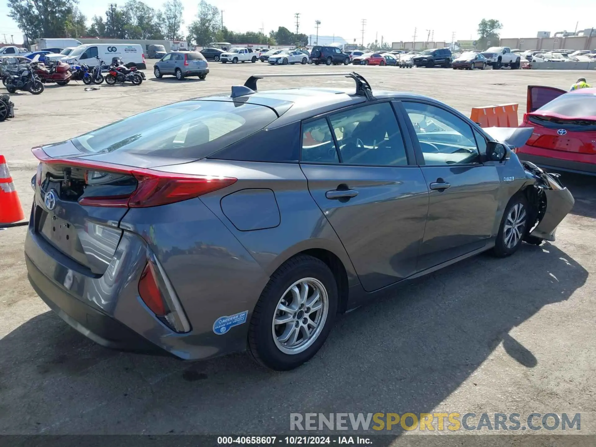 4 Photograph of a damaged car JTDKAMFP1N3202871 TOYOTA PRIUS PRIME 2022