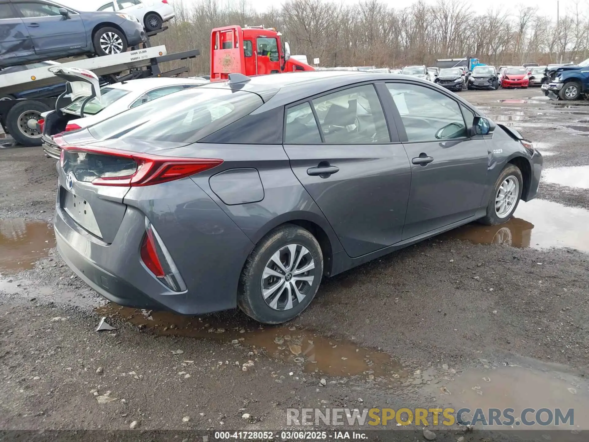 4 Photograph of a damaged car JTDKAMFP1N3218374 TOYOTA PRIUS PRIME 2022