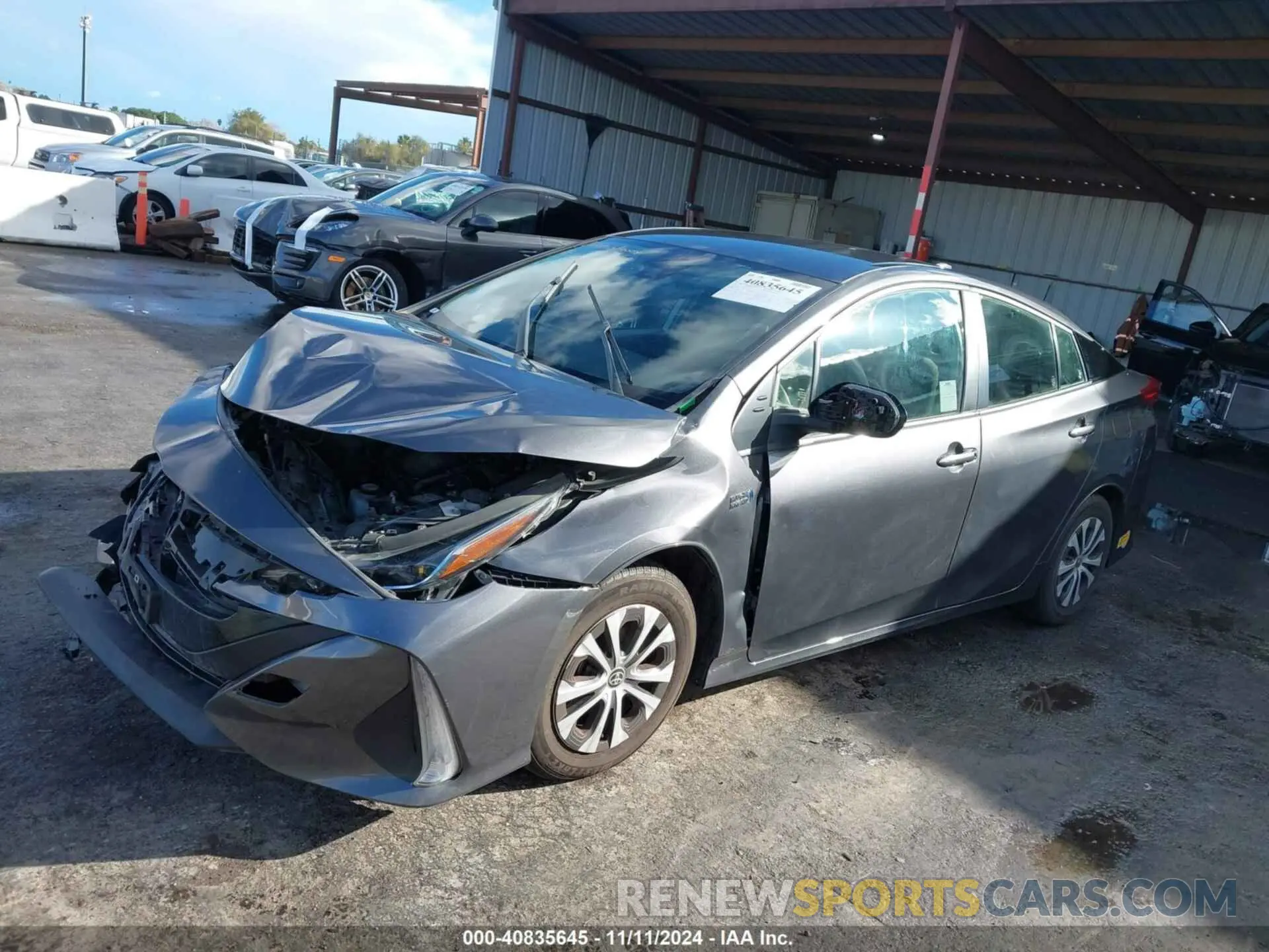 2 Photograph of a damaged car JTDKAMFP2N3226046 TOYOTA PRIUS PRIME 2022