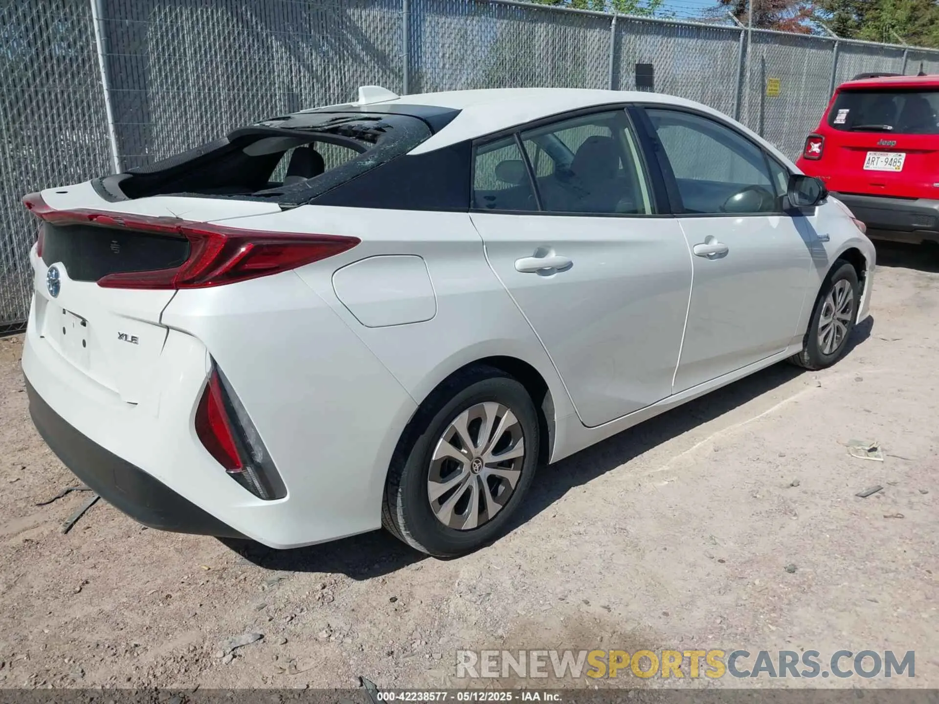 4 Photograph of a damaged car JTDKAMFP3N3202936 TOYOTA PRIUS PRIME 2022