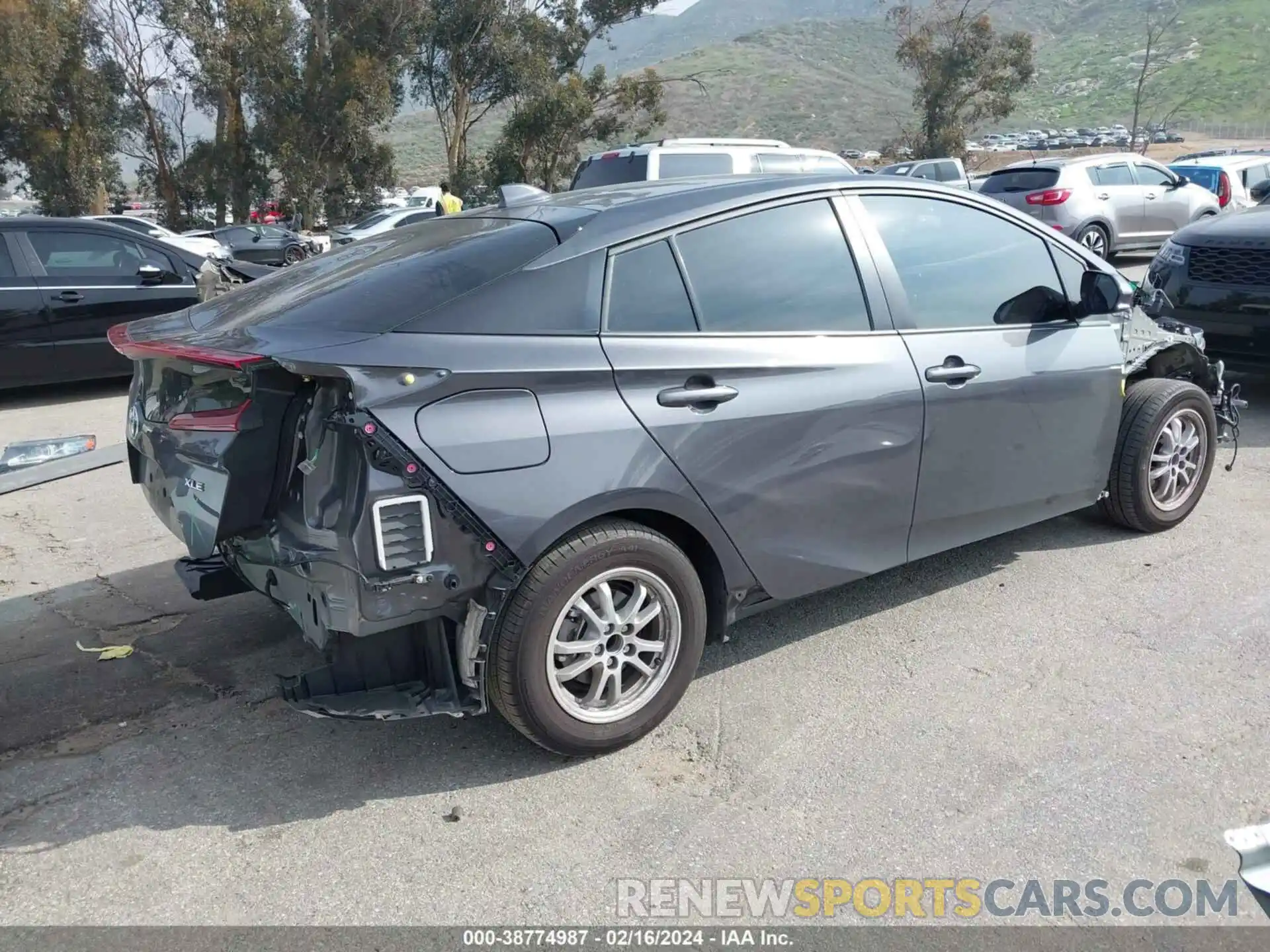 4 Photograph of a damaged car JTDKAMFP3N3229179 TOYOTA PRIUS PRIME 2022