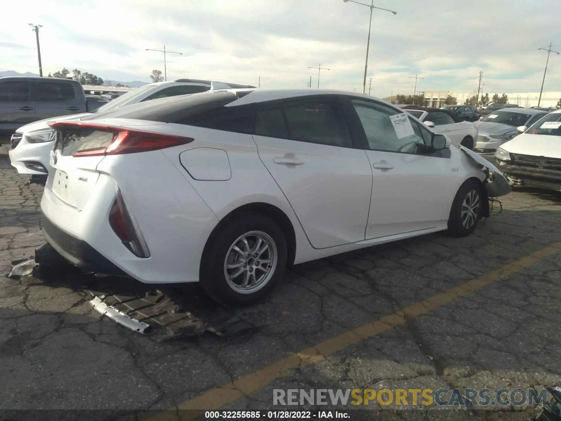 4 Photograph of a damaged car JTDKAMFP4N3200614 TOYOTA PRIUS PRIME 2022