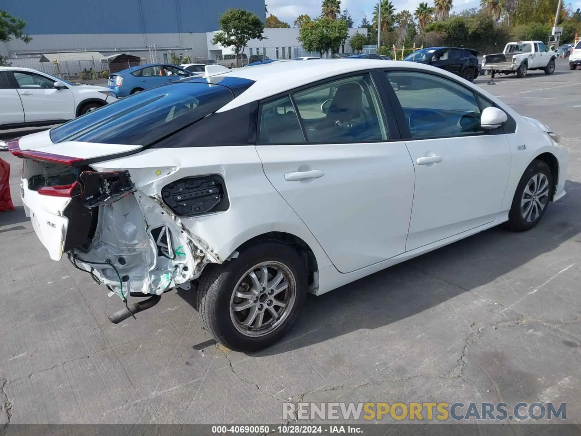 4 Photograph of a damaged car JTDKAMFP4N3221446 TOYOTA PRIUS PRIME 2022