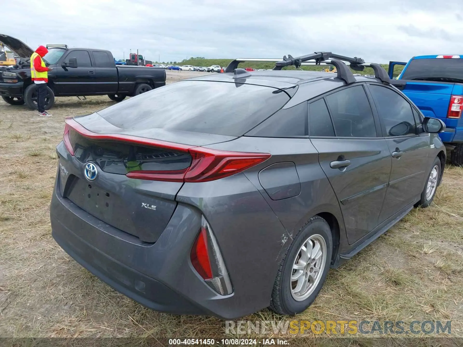 4 Photograph of a damaged car JTDKAMFP5N3219933 TOYOTA PRIUS PRIME 2022