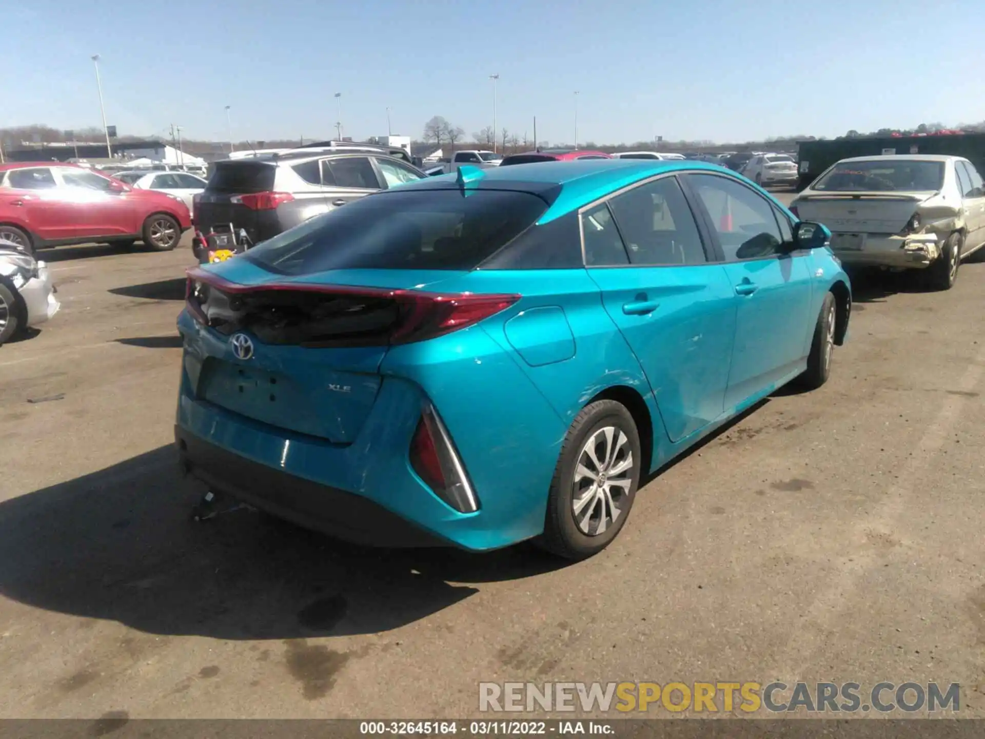 4 Photograph of a damaged car JTDKAMFP7N3200283 TOYOTA PRIUS PRIME 2022