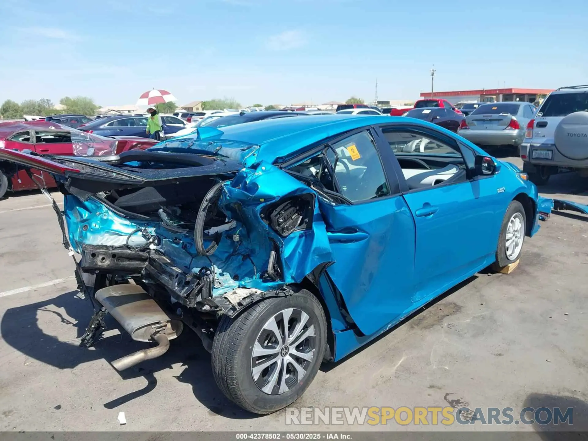 4 Photograph of a damaged car JTDKAMFP7N3205631 TOYOTA PRIUS PRIME 2022