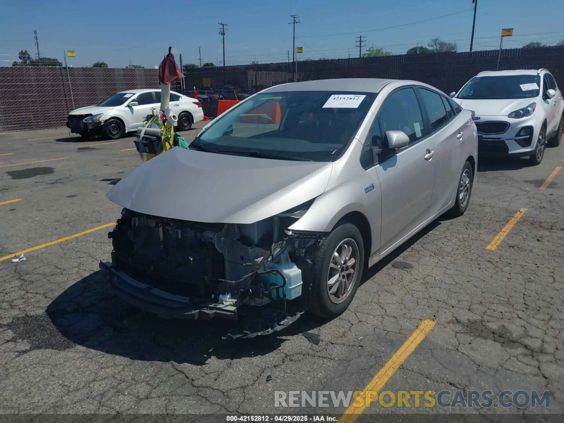 2 Photograph of a damaged car JTDKAMFP9N3206943 TOYOTA PRIUS PRIME 2022