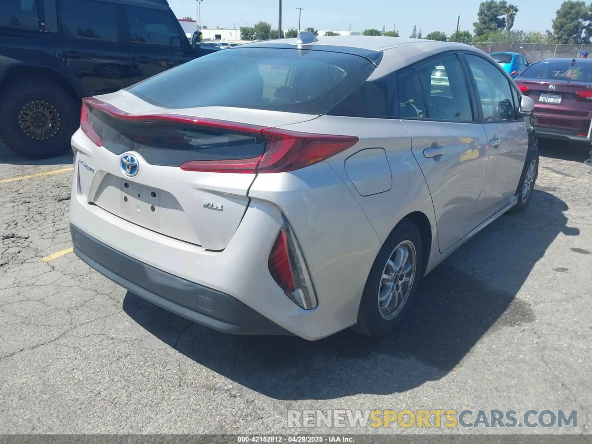 4 Photograph of a damaged car JTDKAMFP9N3206943 TOYOTA PRIUS PRIME 2022