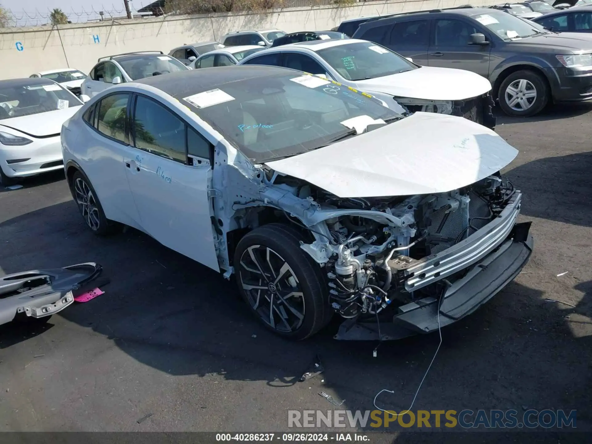 1 Photograph of a damaged car JTDACACU2P3000896 TOYOTA PRIUS PRIME 2023